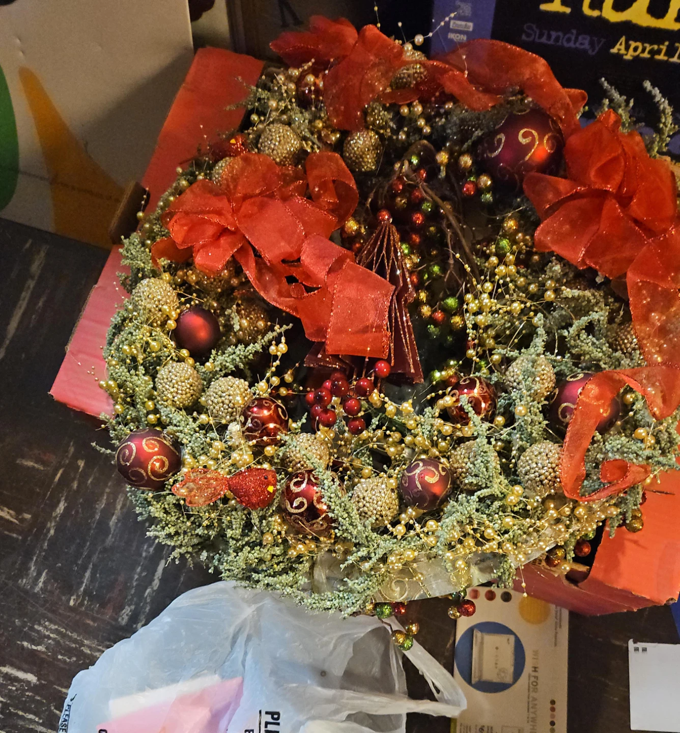 Christmas Wreath with Ornaments and Red Ribbons
