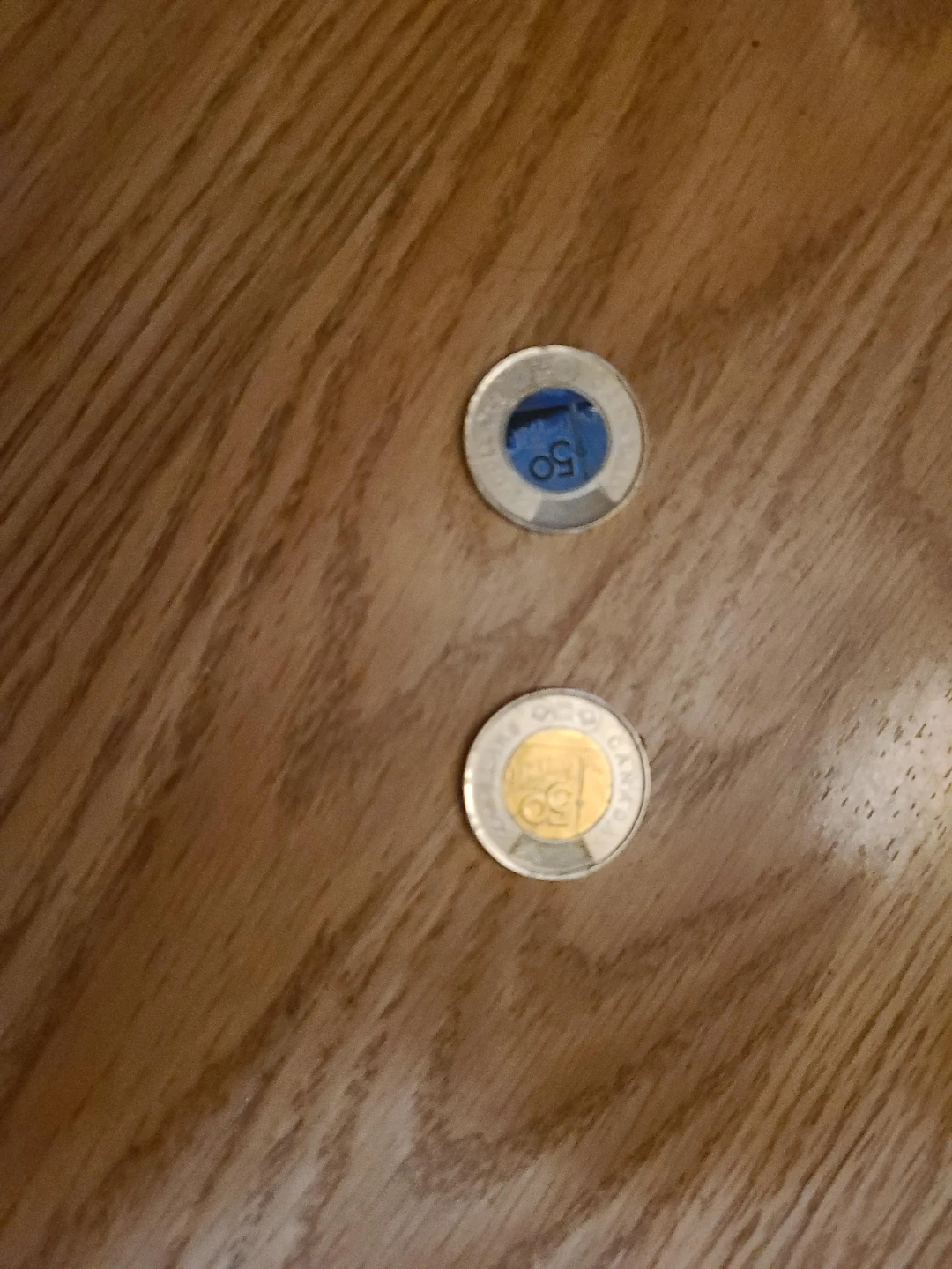 Two Canadian 50 Cent Coins