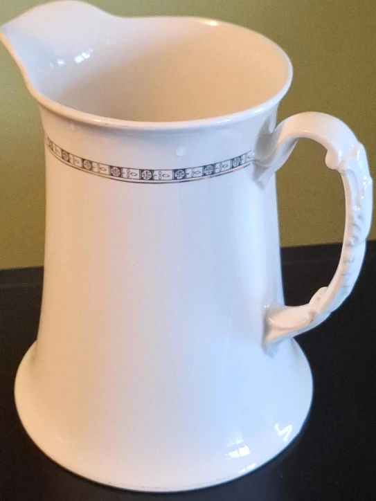 White Ceramic Pitcher with Decorative Band