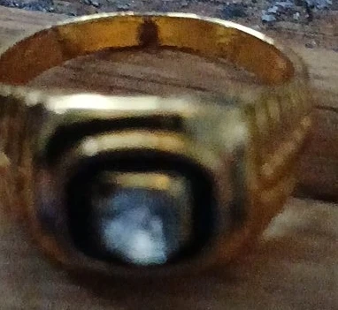 Gold Tone Ring with Black Stone Accent