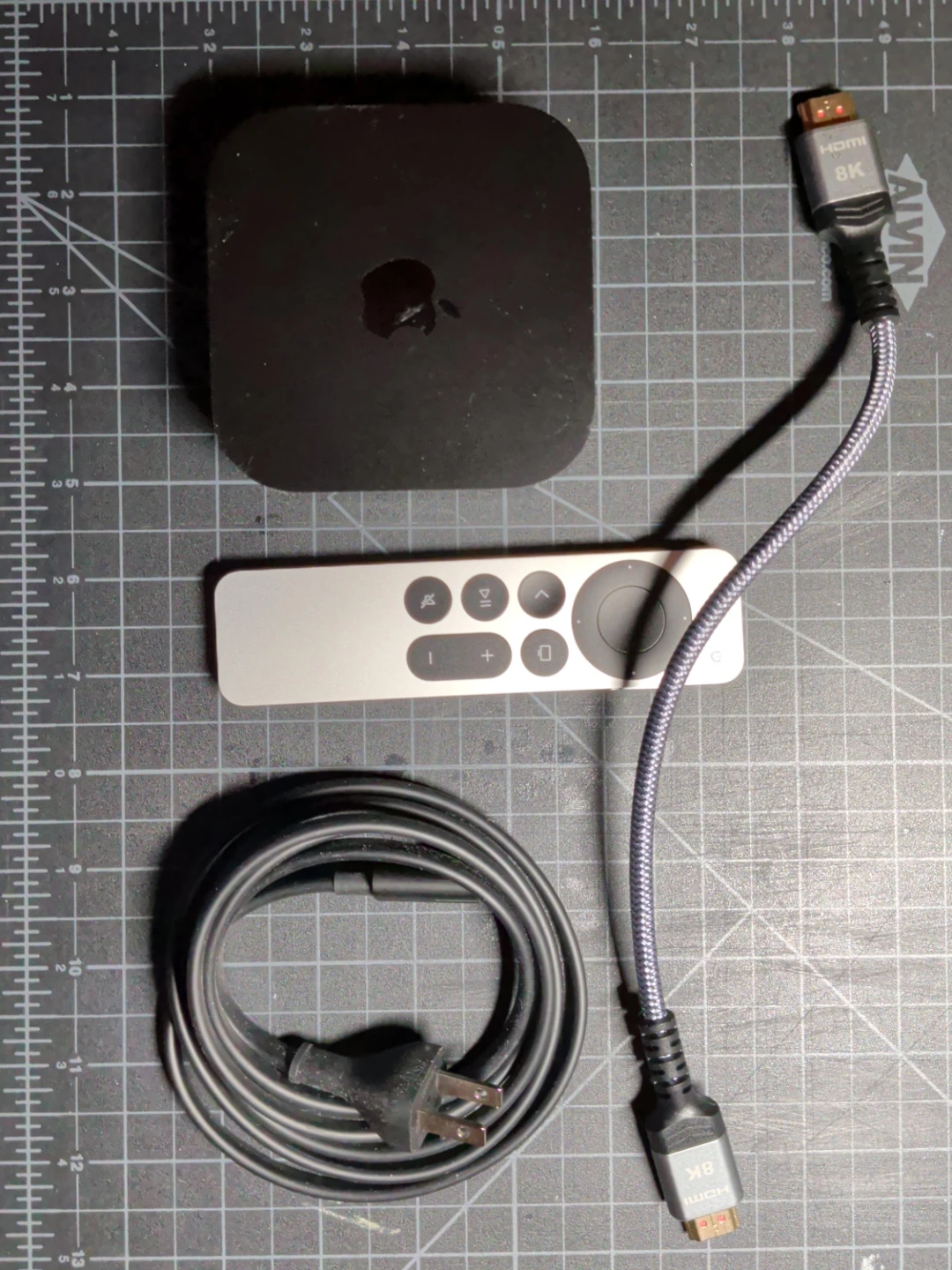 Apple TV 4K with Siri Remote and HDMI cable