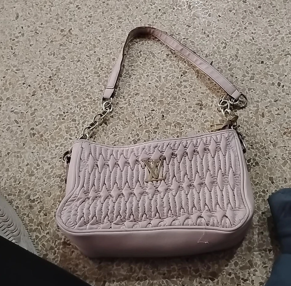 Light Pink Quilted Handbag with Gold 'LV' Logo