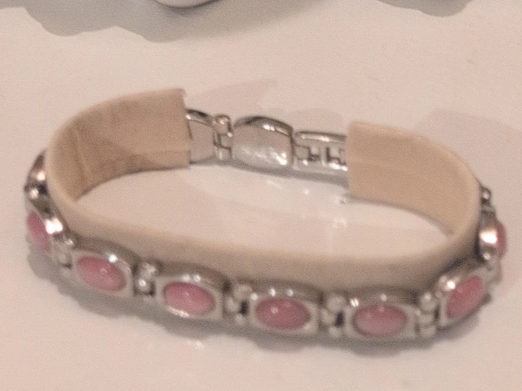 Silver-tone bracelet with pink oval stones