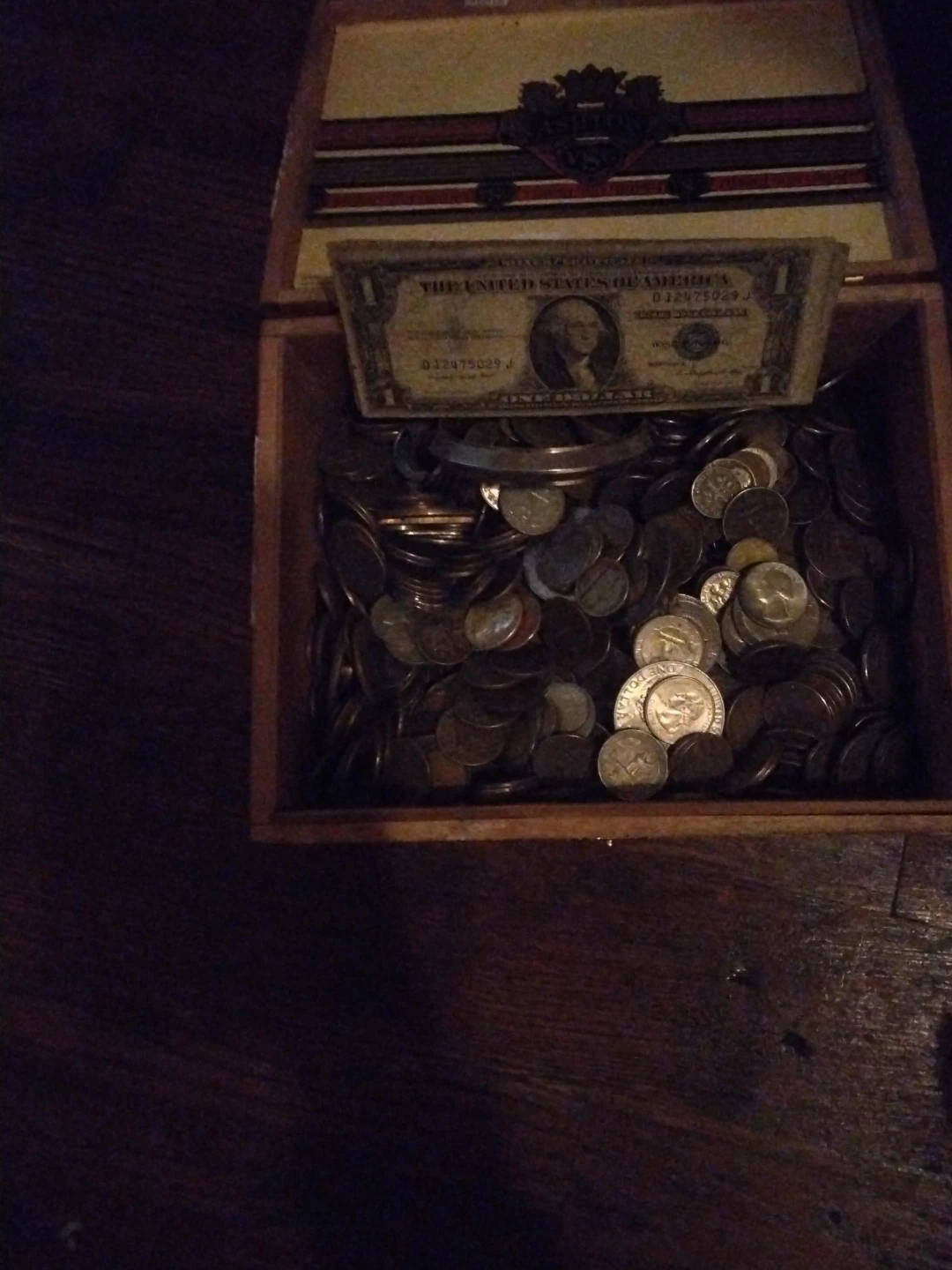 Wooden Box with Coins and One Dollar Bill