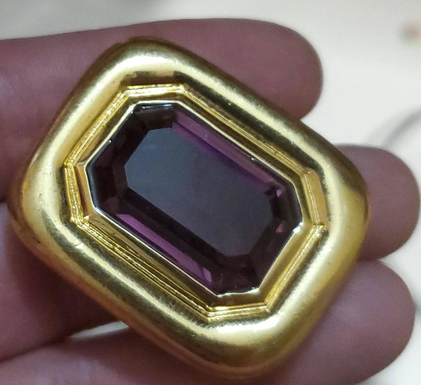 Vintage Gold tone brooch with purple stone