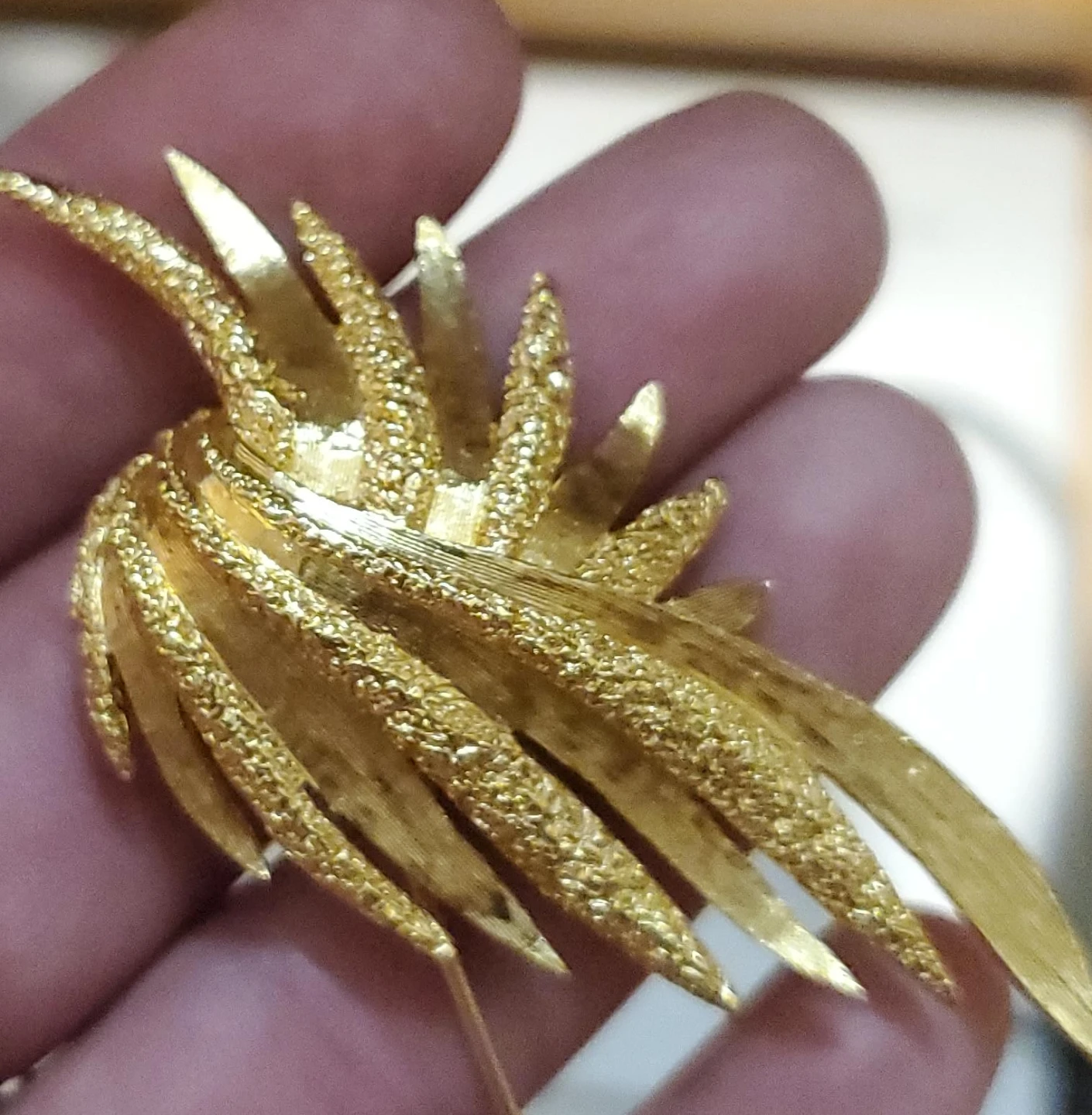 Gold-tone abstract design brooch