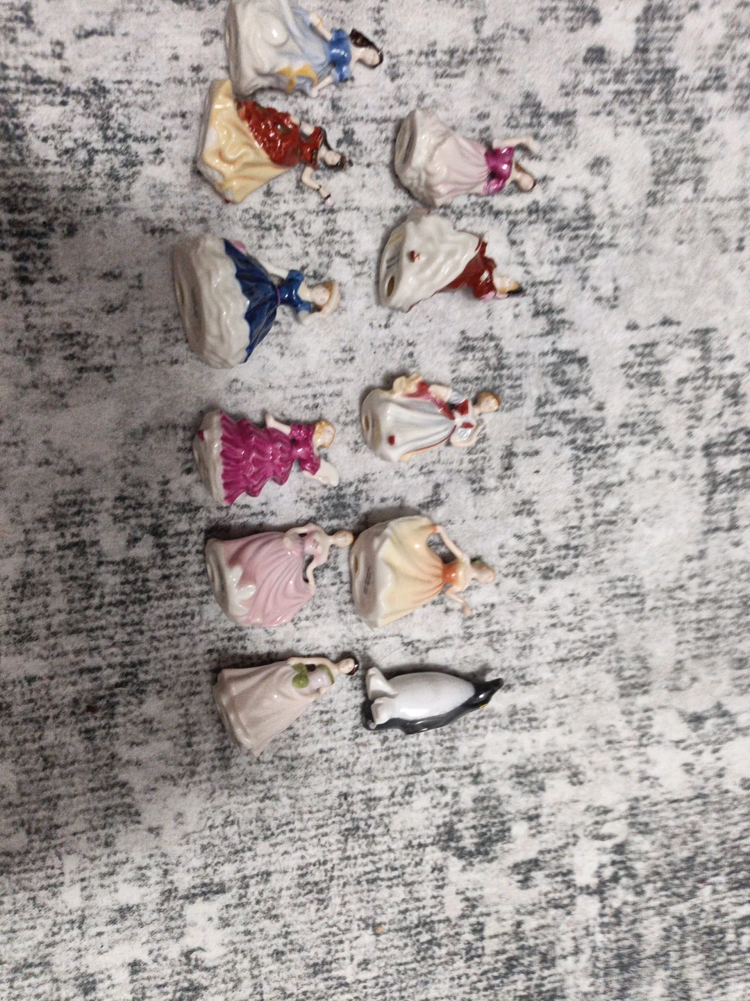 Collection of 9 Porcelain Figurines