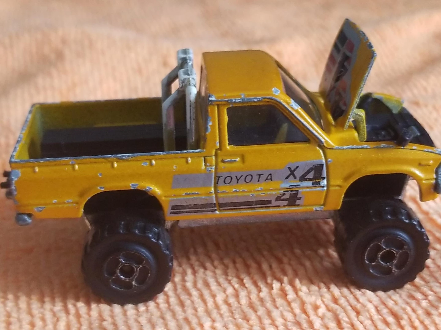 Yellow Toyota X4 Diecast Toy Truck