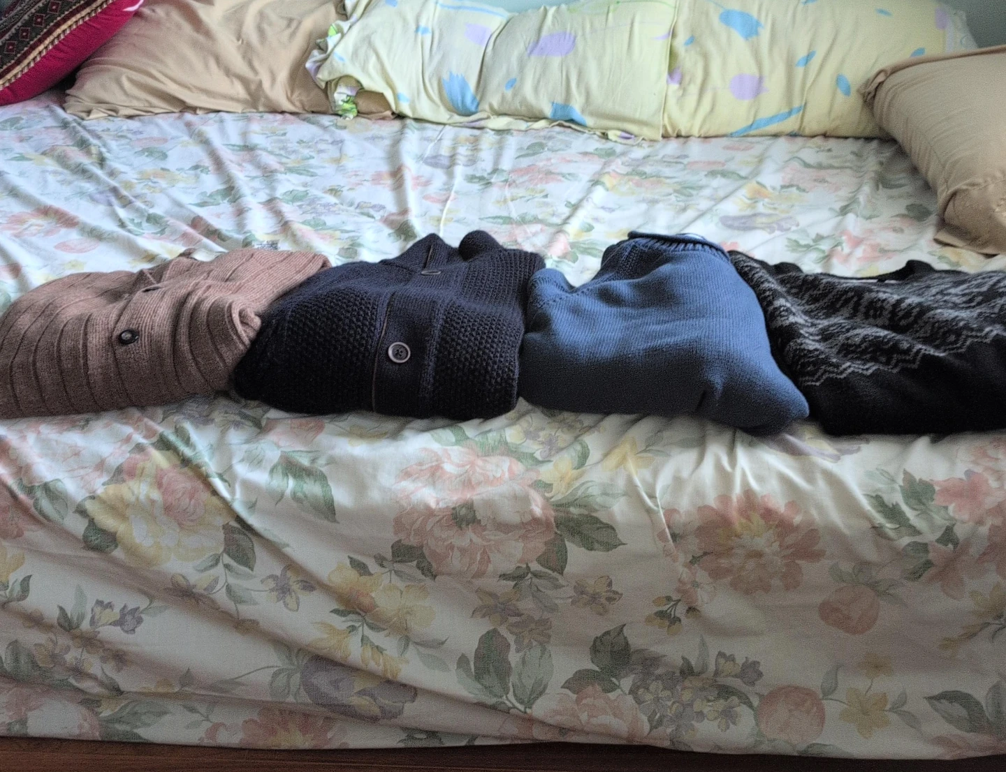 Four assorted men's sweaters