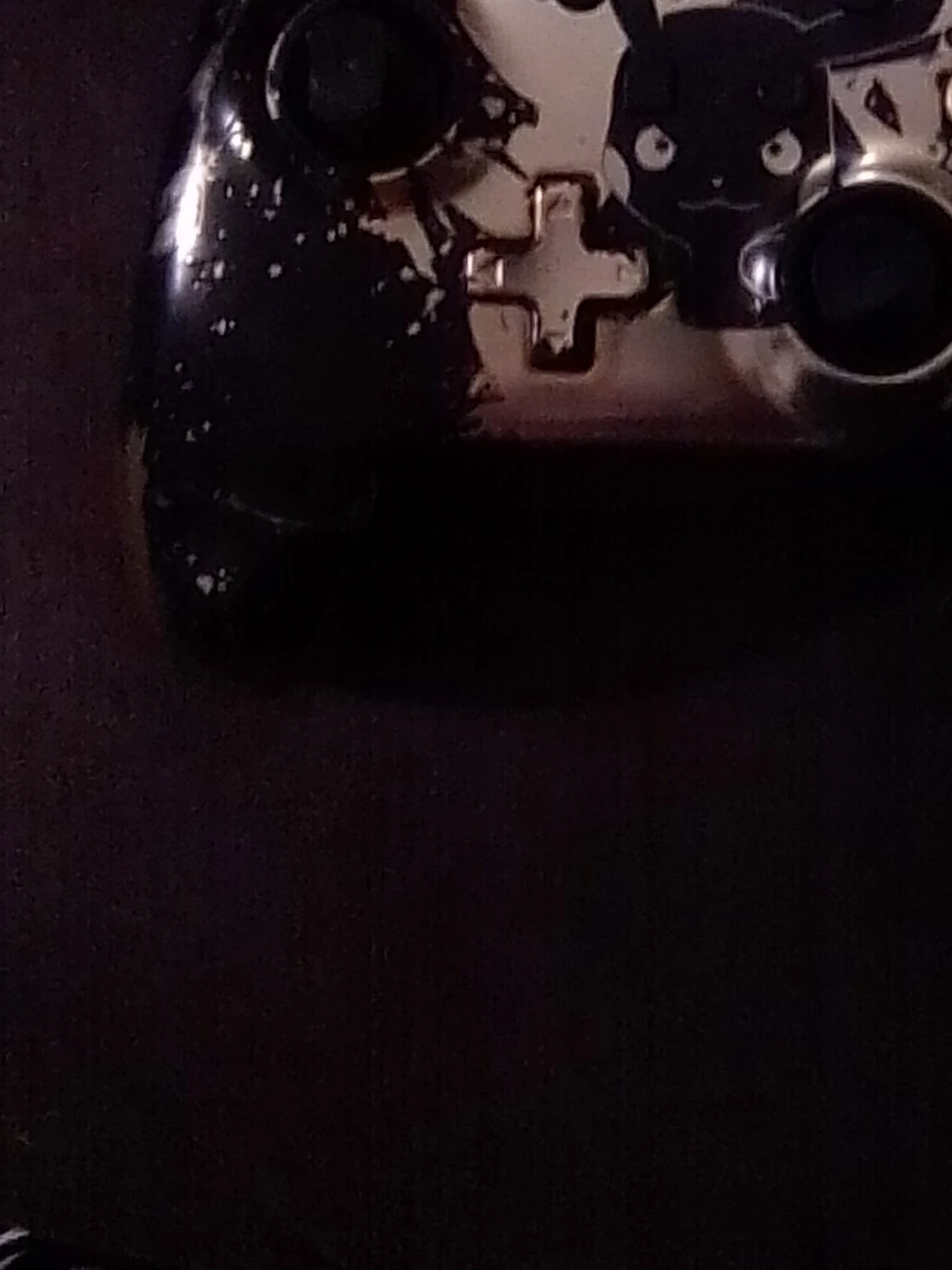 Customized Black Gaming Controller with Pikachu Design