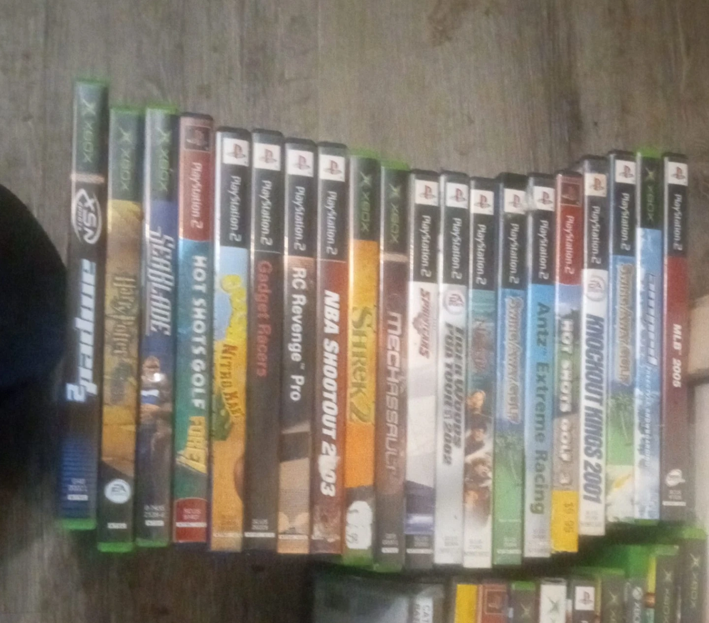 Collection of Xbox and PlayStation 2 Games