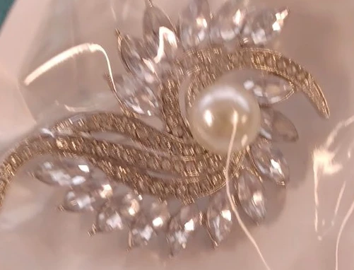 Elegant Pearl and Crystal Brooch