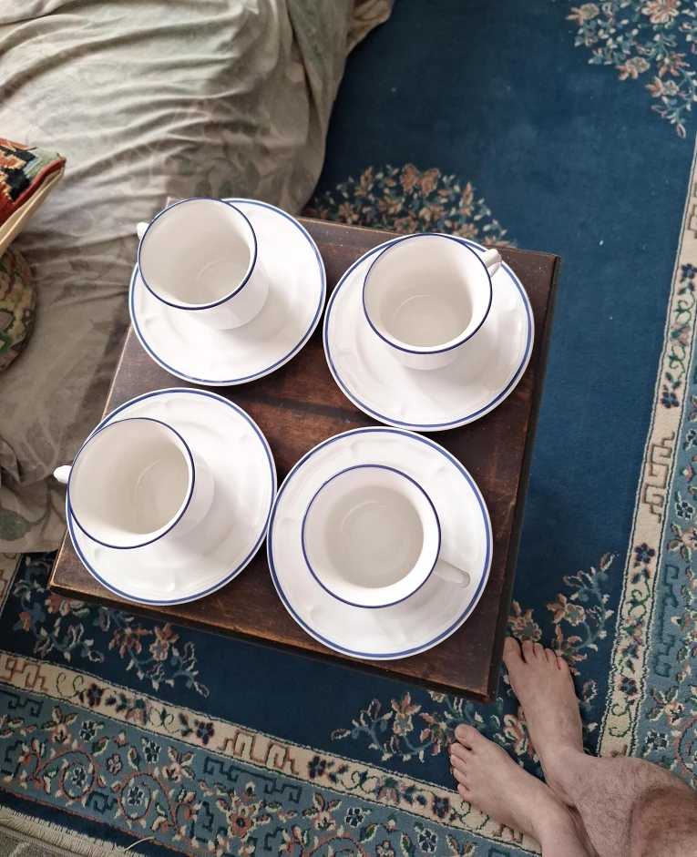 Set of 4 White Ceramic Coffee Cups and Saucers with Blue Rim