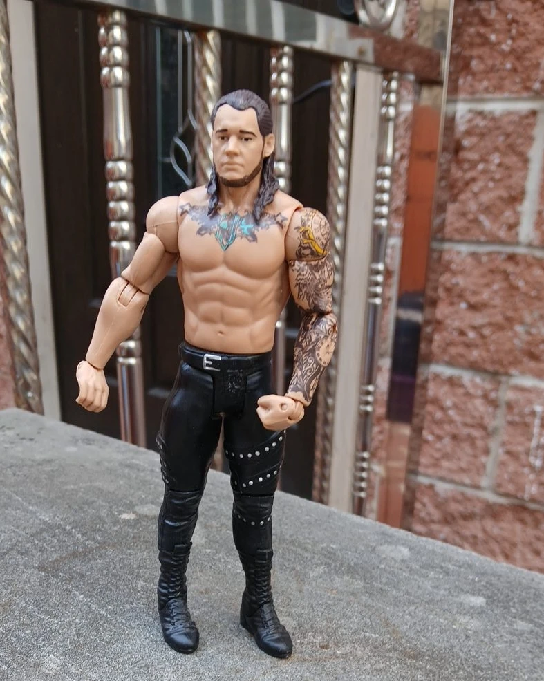 WWE Action Figure - "The Charismatic Enigma"