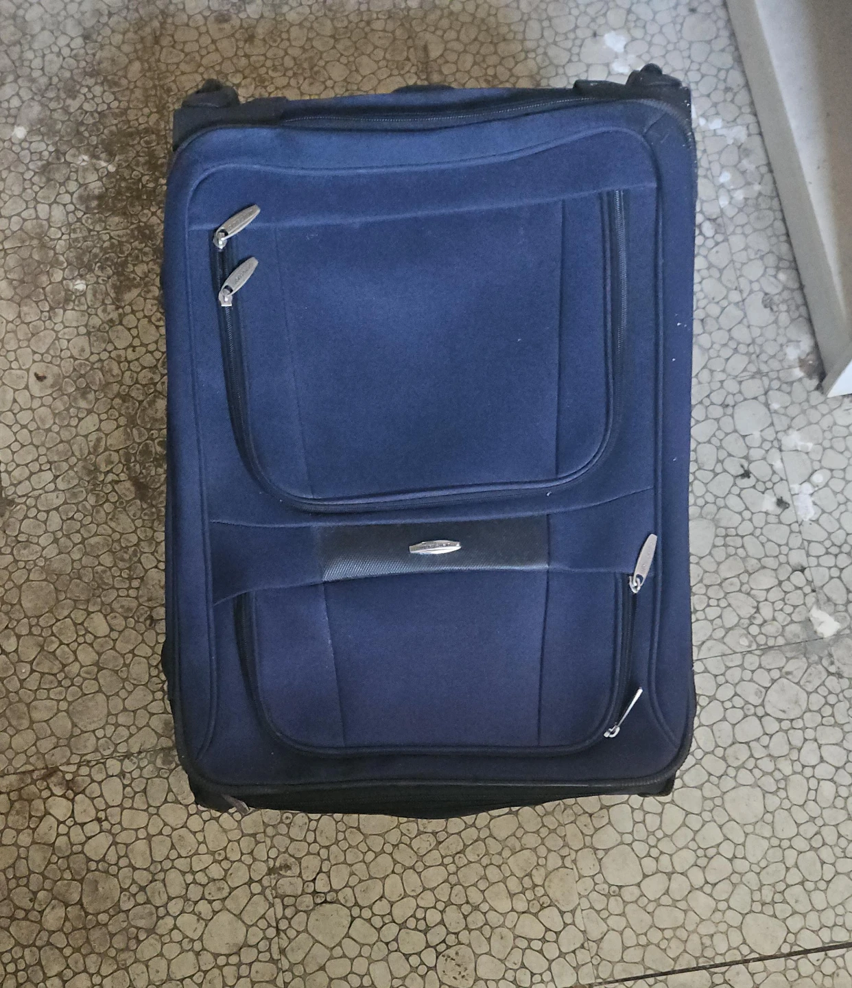 Blue Delsey Spinner Suitcase
