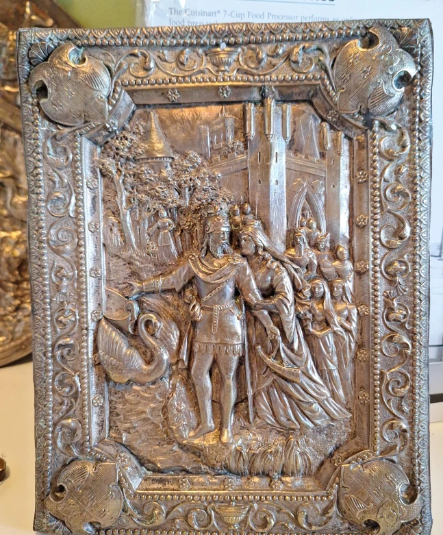 Ornate Embossed Metal Plaque with Castle and Swan Scene