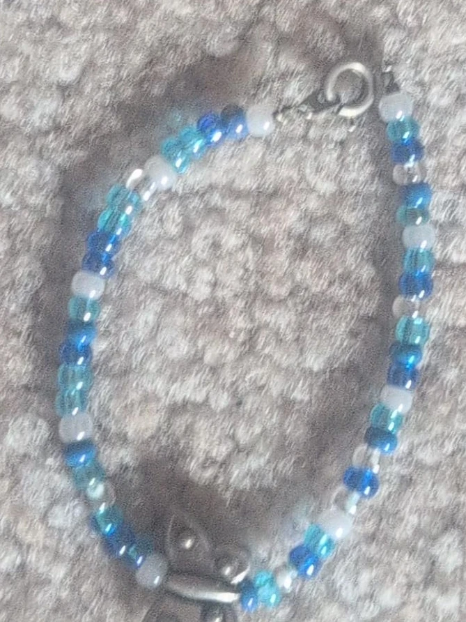 Blue and White Beaded Bracelet with Butterfly Charm