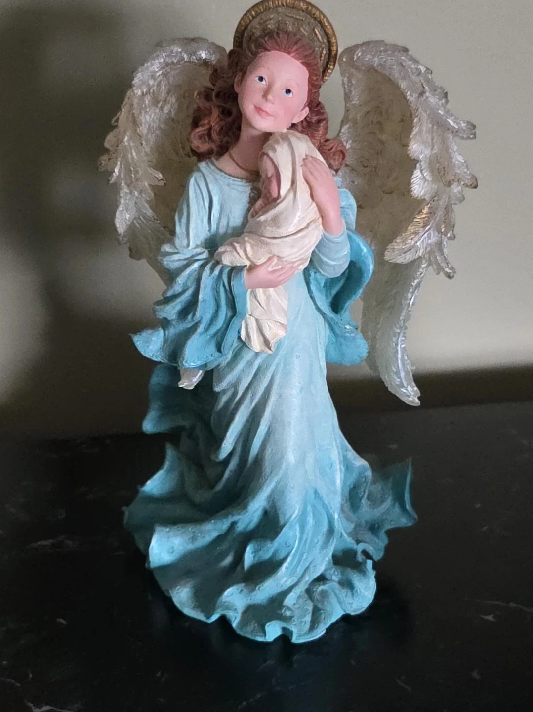 Angel Holding Baby Figurine