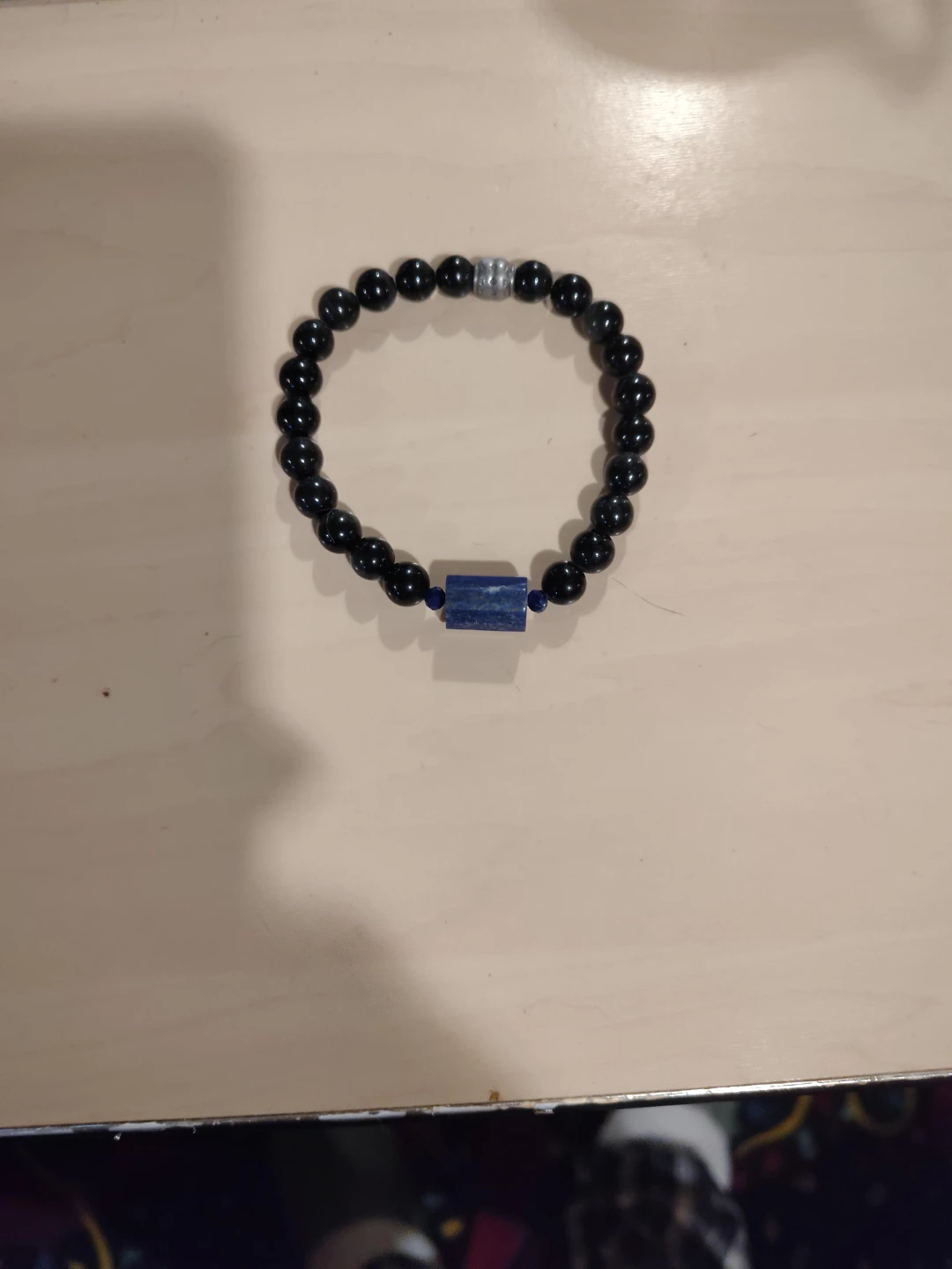 Black Beaded Stretch Bracelet with Blue Stone Accent