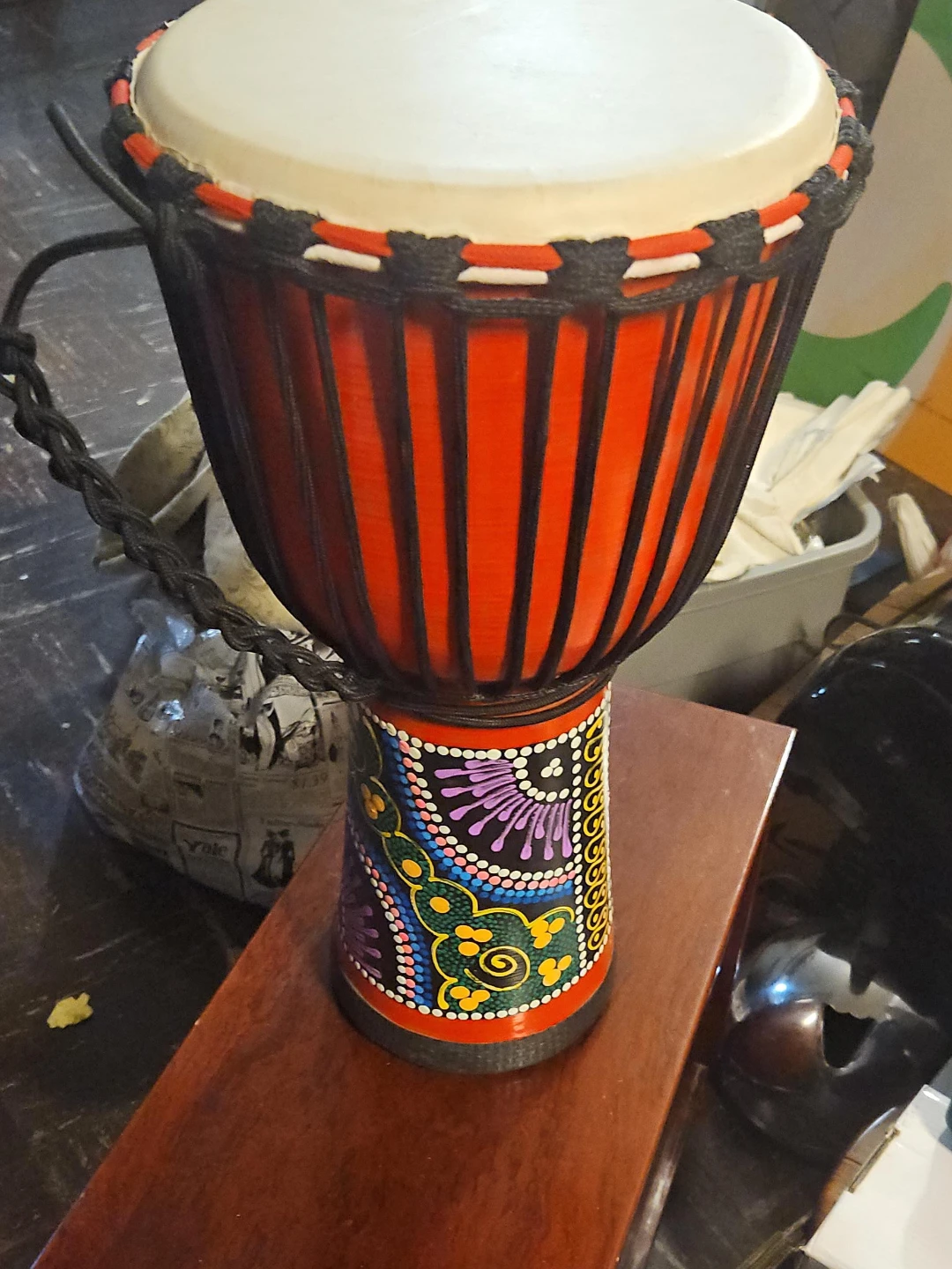 Djembe Drum with Red Body and Decorative Base