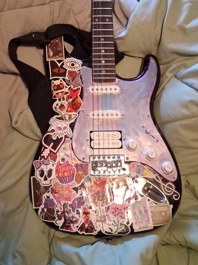 Electric Guitar with Assorted Stickers