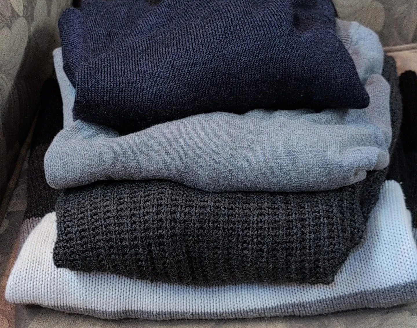 Stack of Men's Sweaters