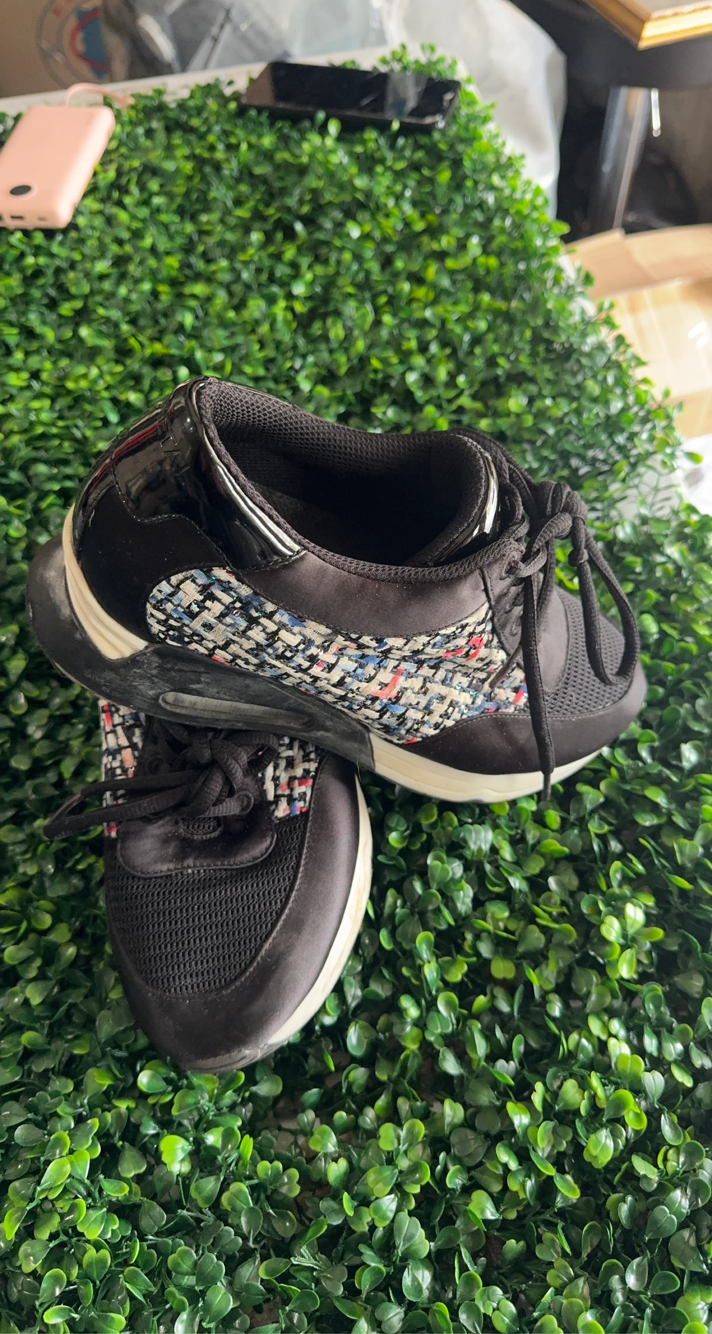 Black fashion sneakers with colorful tweed accents