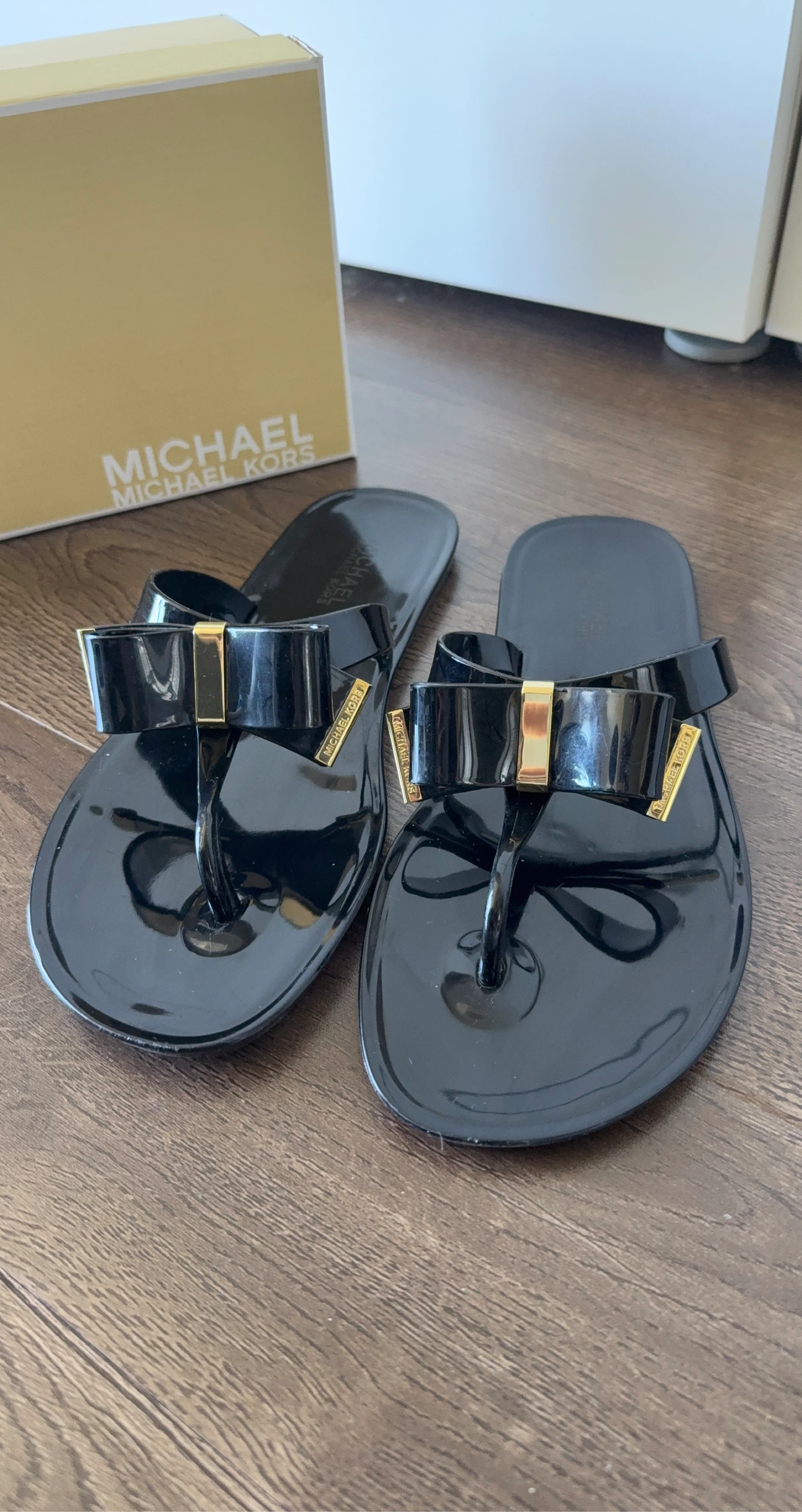 Michael Kors Black Kayden Jelly Bow Flip Flops (size 8)