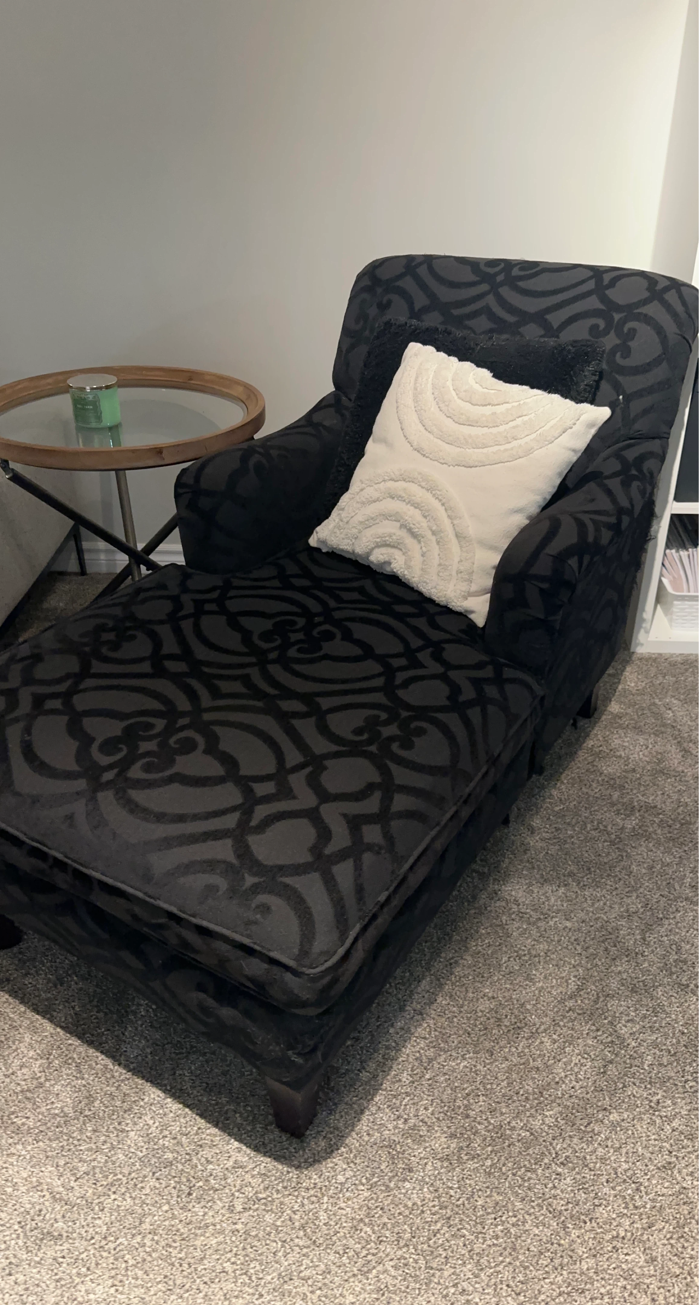 Black damask chaise lounge with pillows