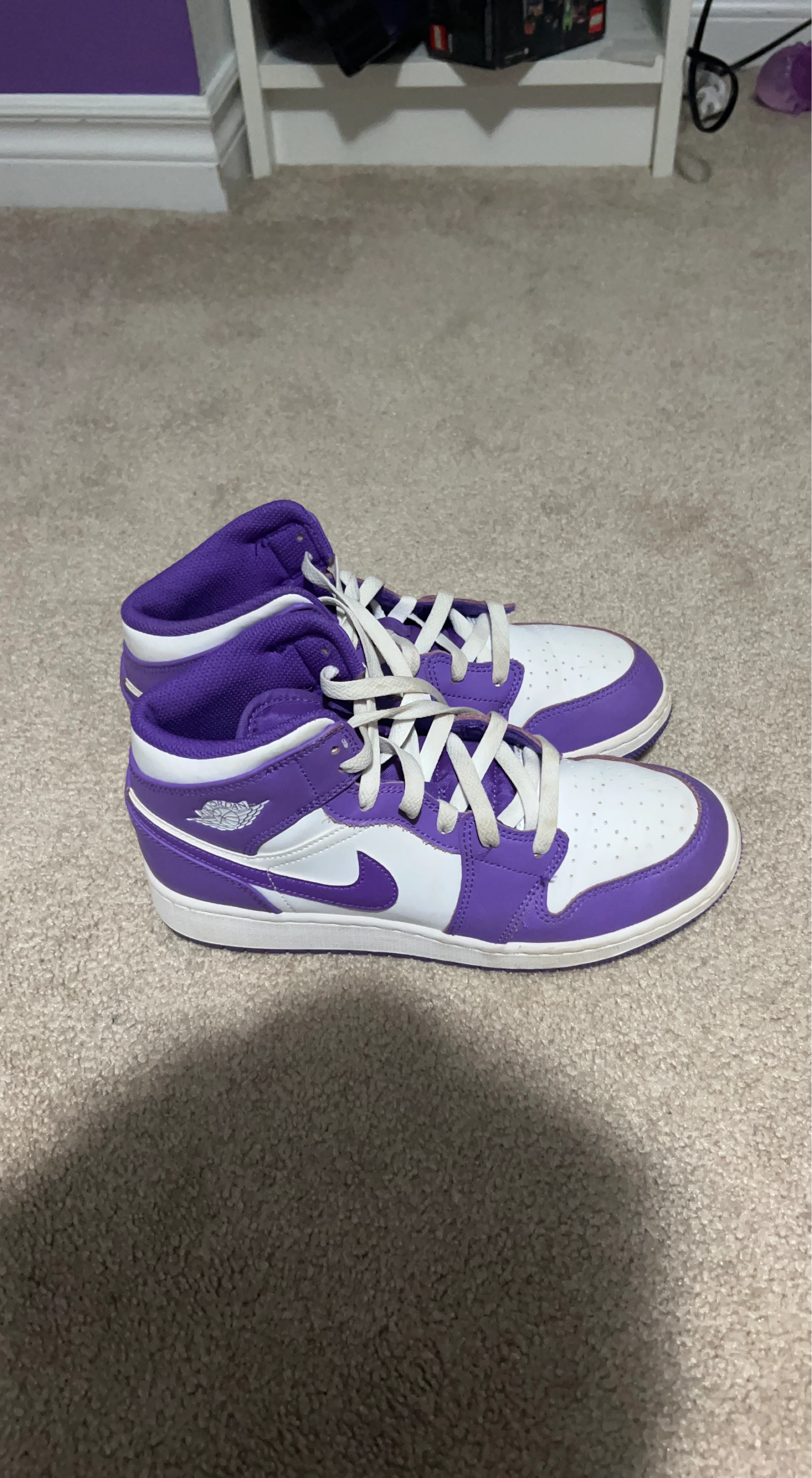 Air Jordan 1 Mid Purple and White Sneakers