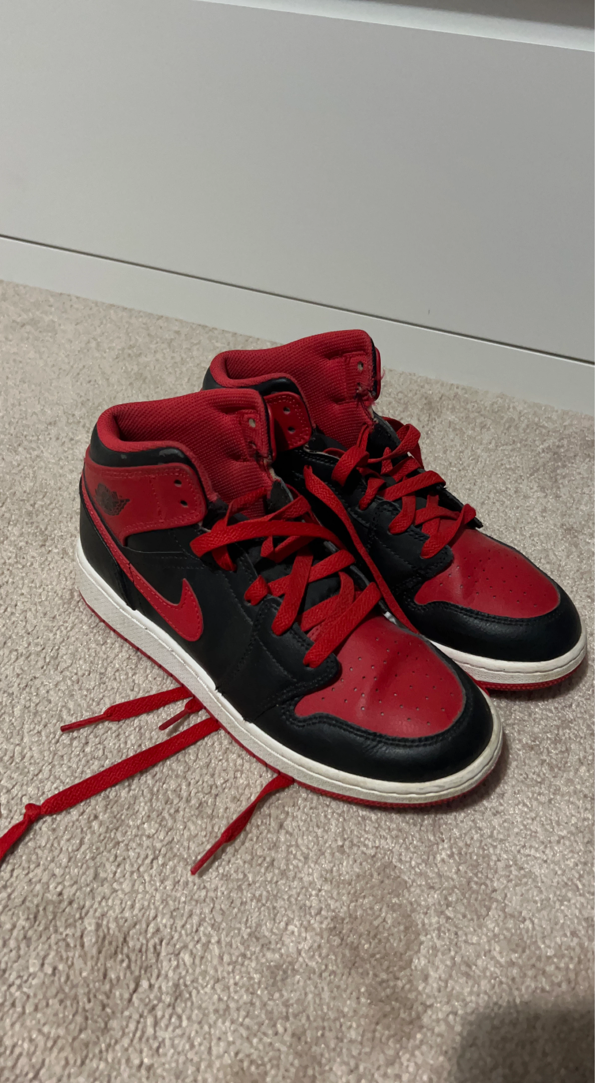 Air Jordan 1 Mid Red Black Sneakers