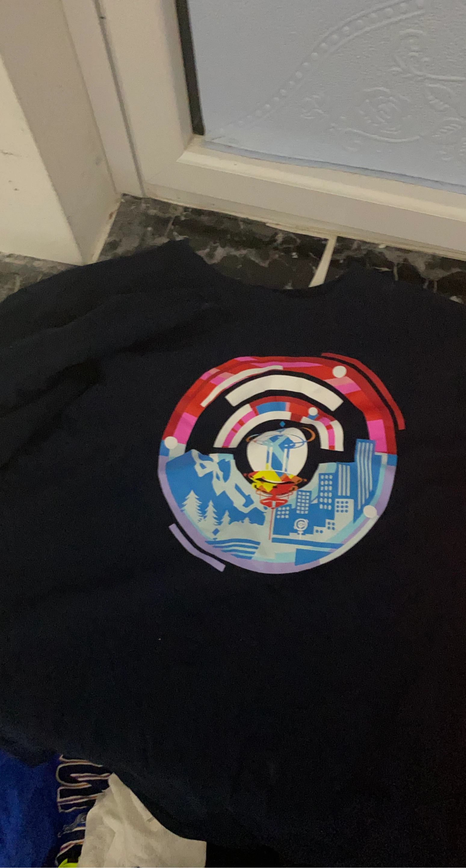 Black T-Shirt with Circular Graphic