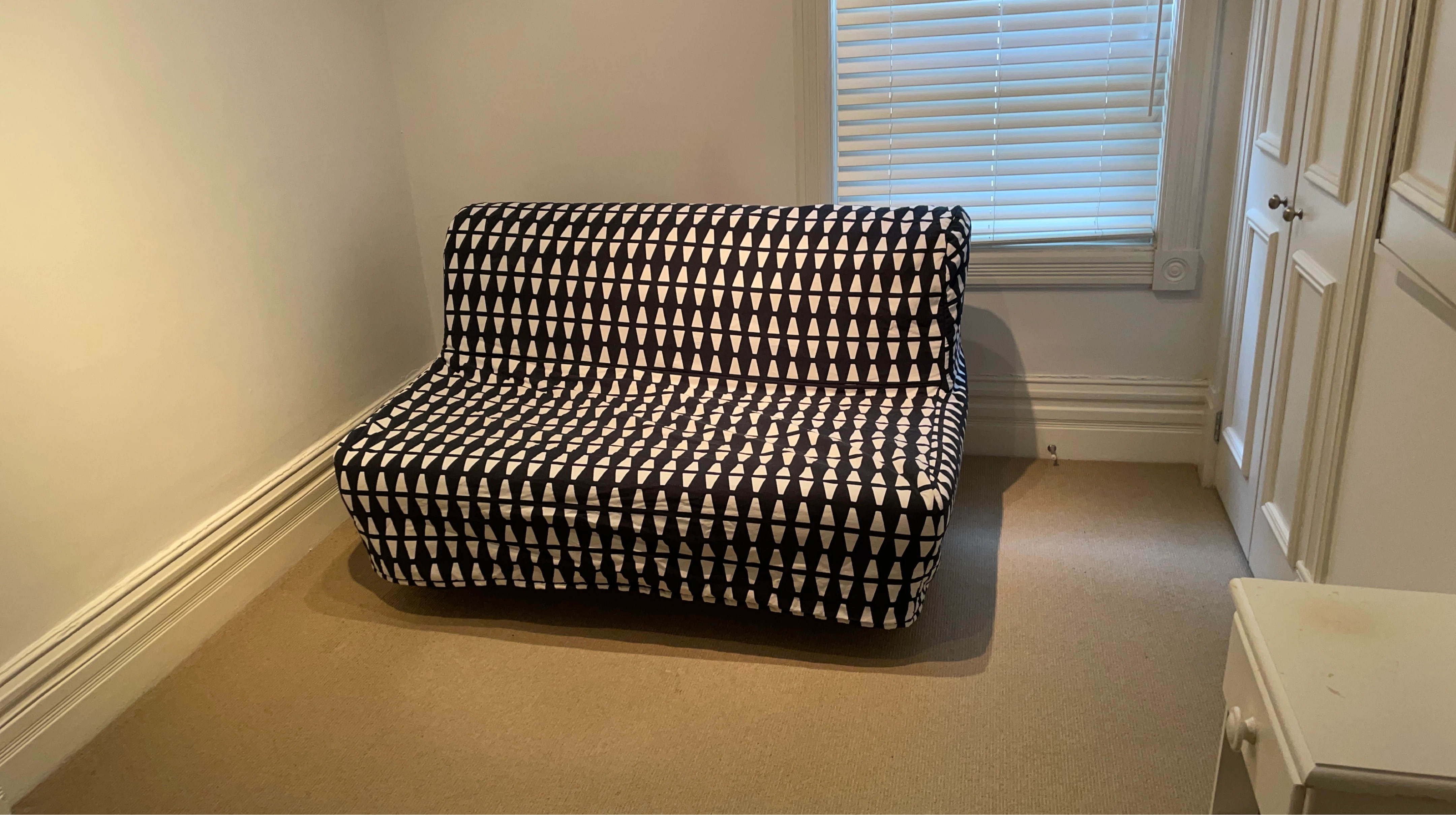 Ikea Lycksele Futon sofa bed with patterned cover