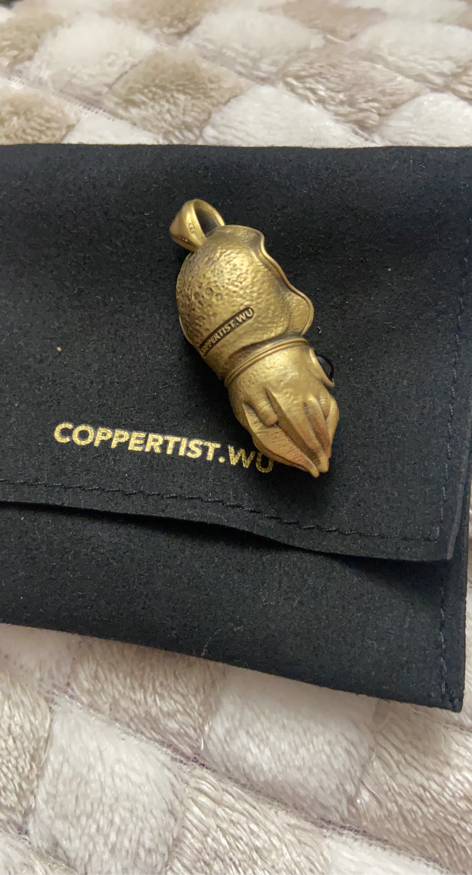 Coppertist.Wu Miniature Squid Pendant with Hidden Knife