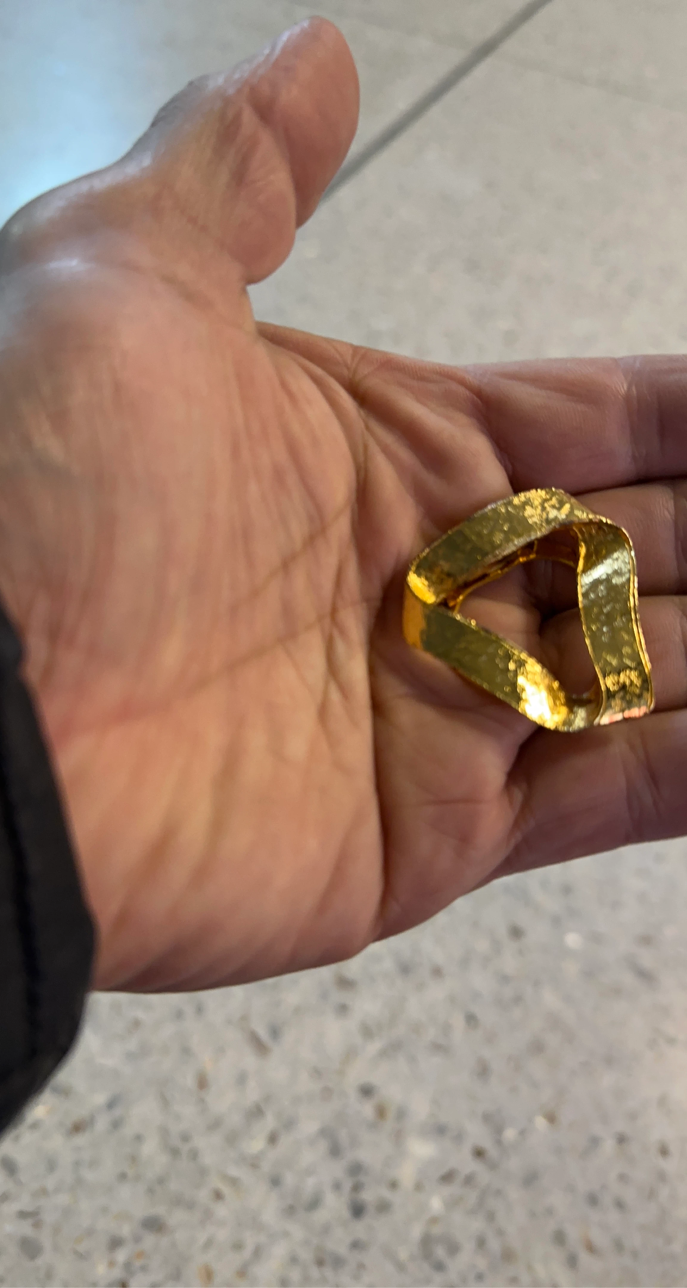 Gold Tone Twisted Triangle Pendant