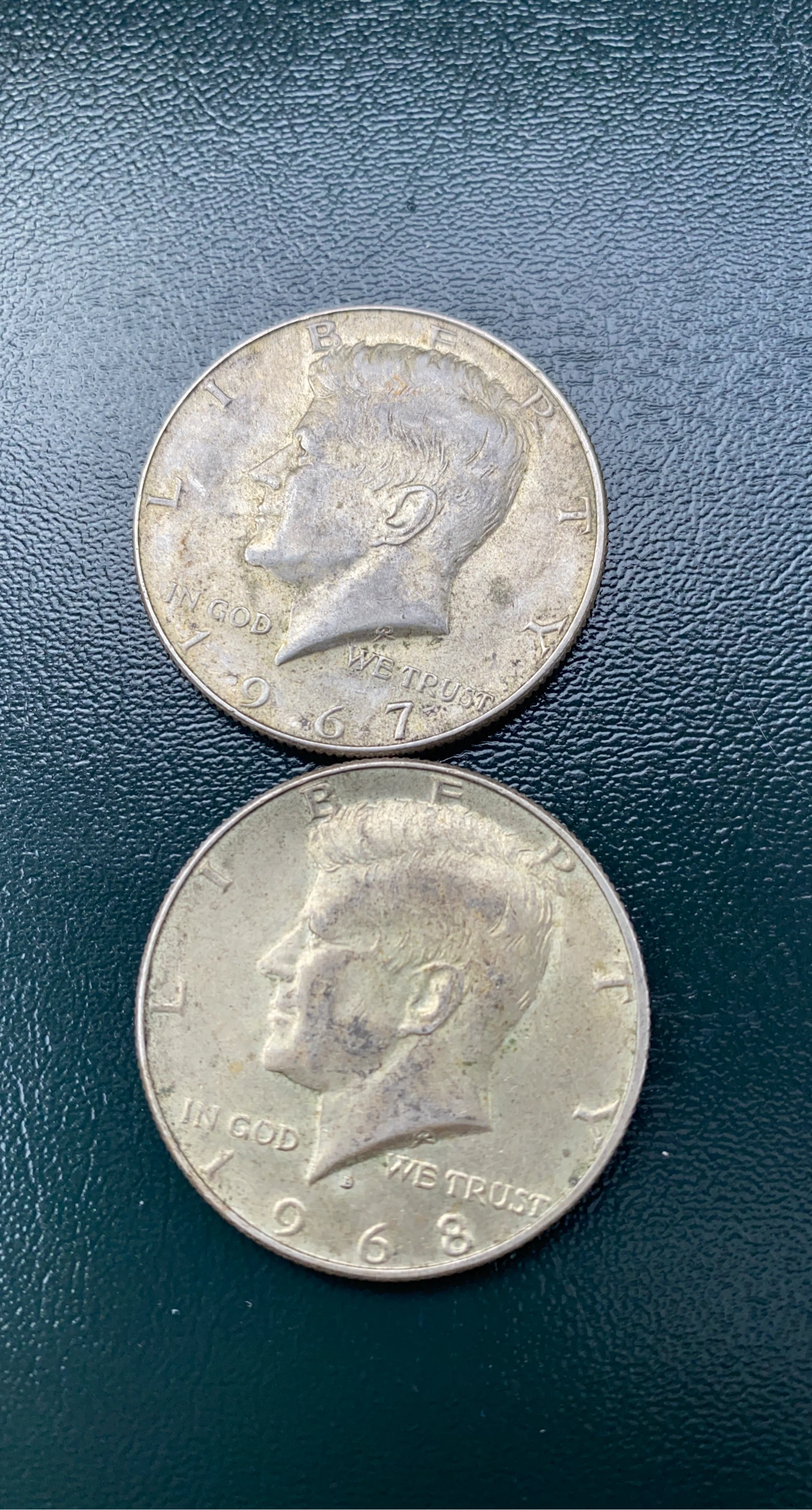 Two silver 1960s Kennedy Half Dollar Coins