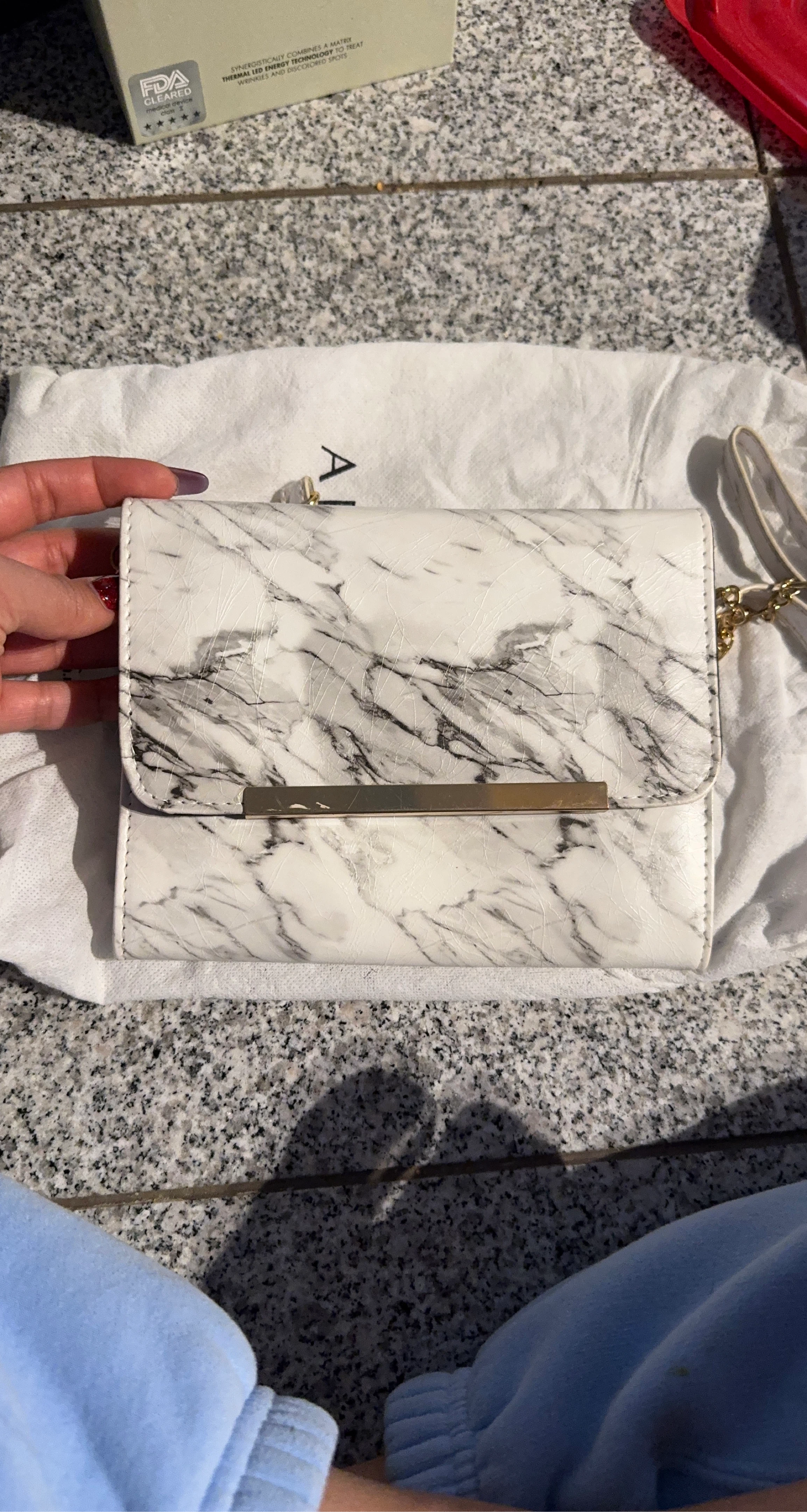 AI clutch bag with marble print