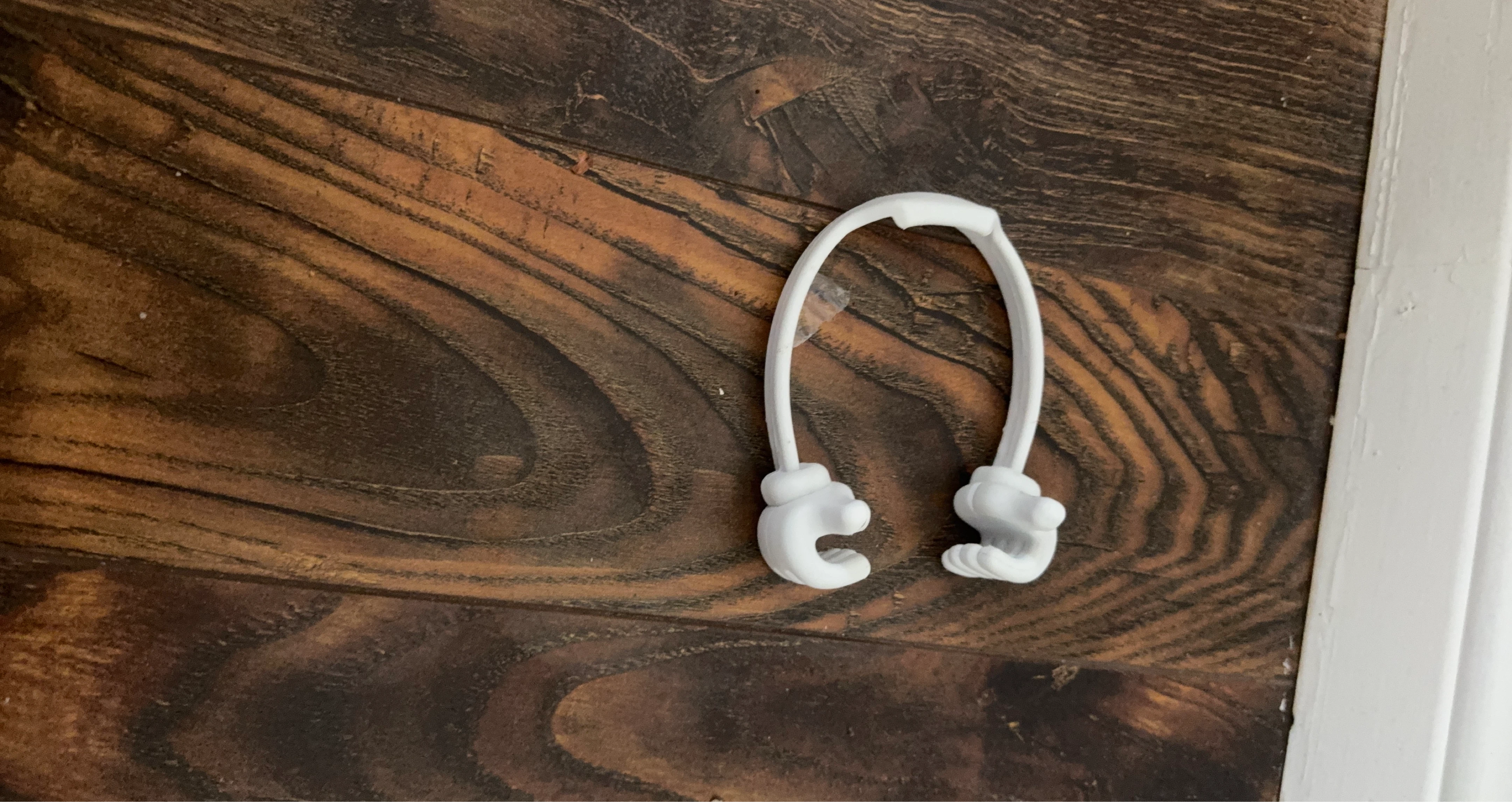 White U-Shaped Clip with Hand-Shaped Ends