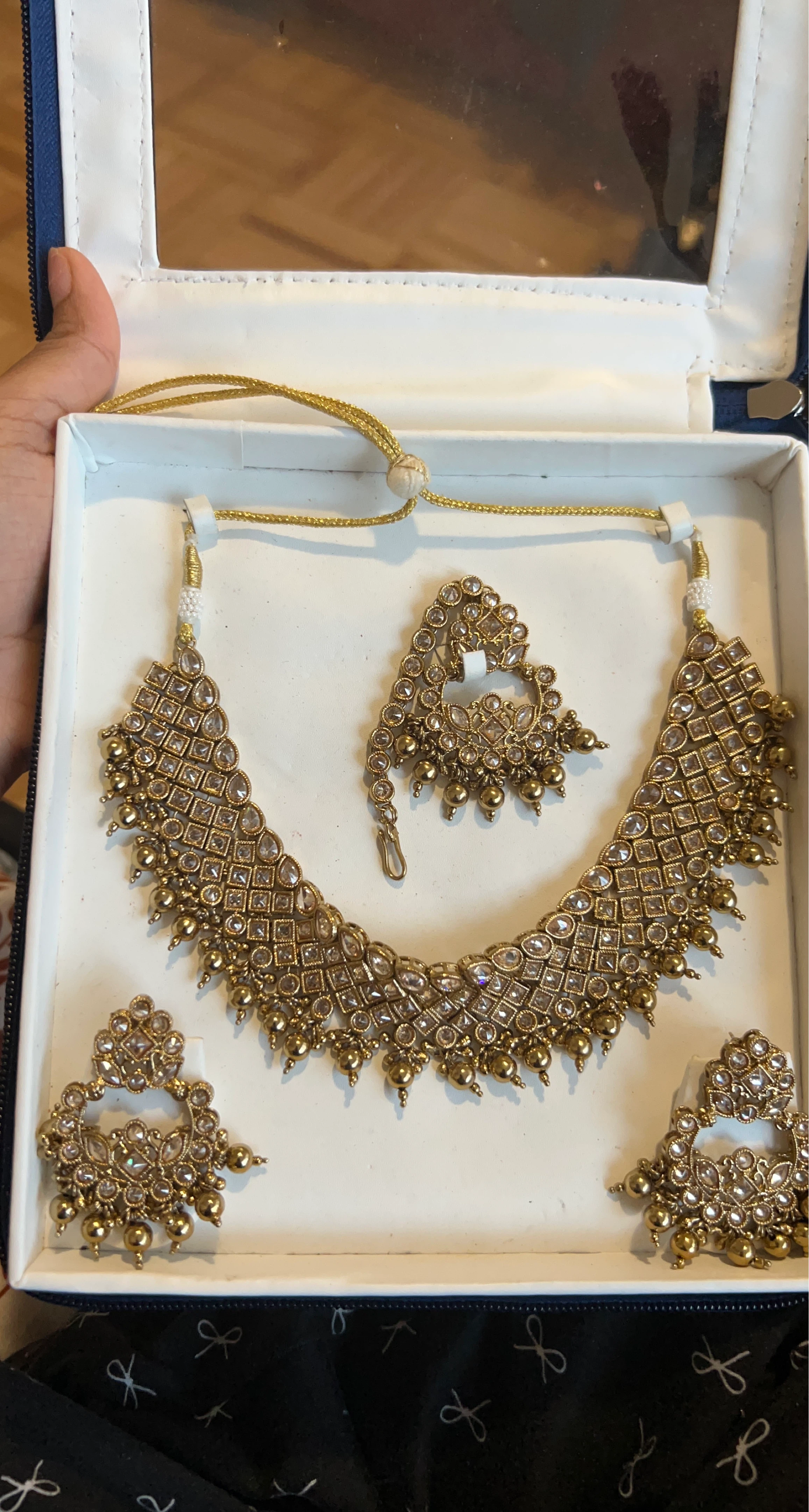 Gold Tone Kundan Necklace Set with Earrings and Tikka