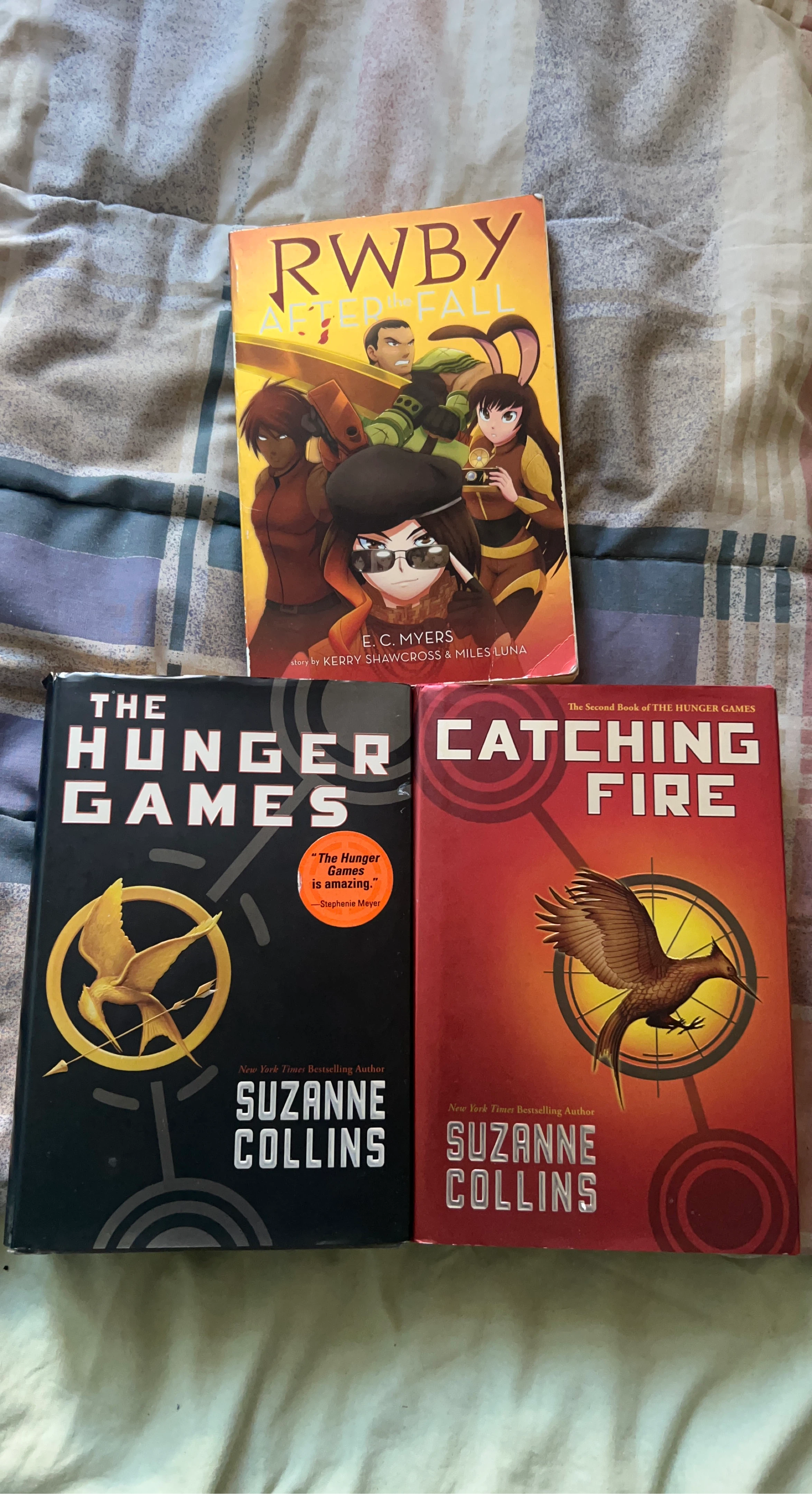 The Hunger Games, Catching Fire, and RWBY Books