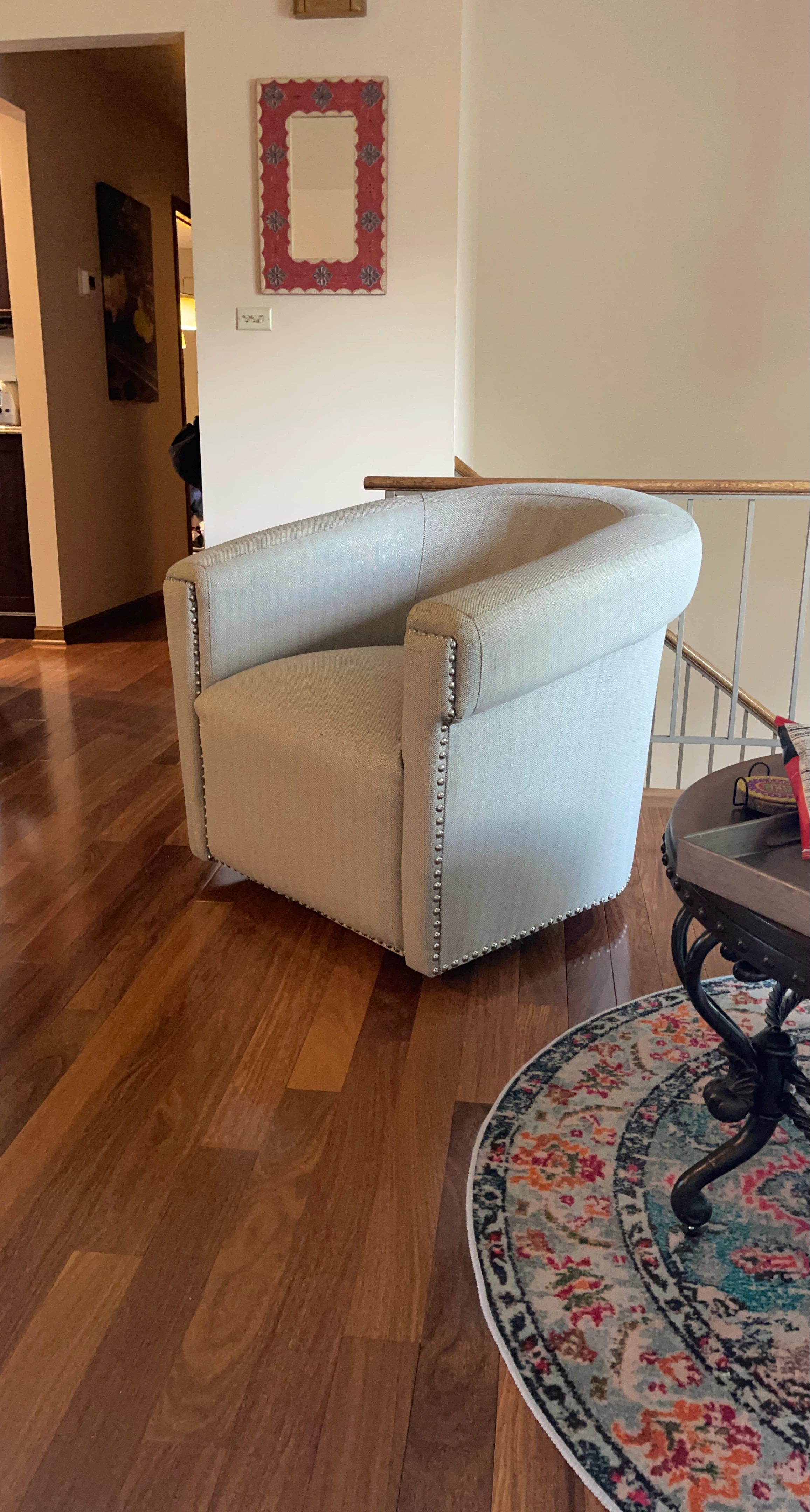 Light Tan Upholstered Accent Chair with Studs