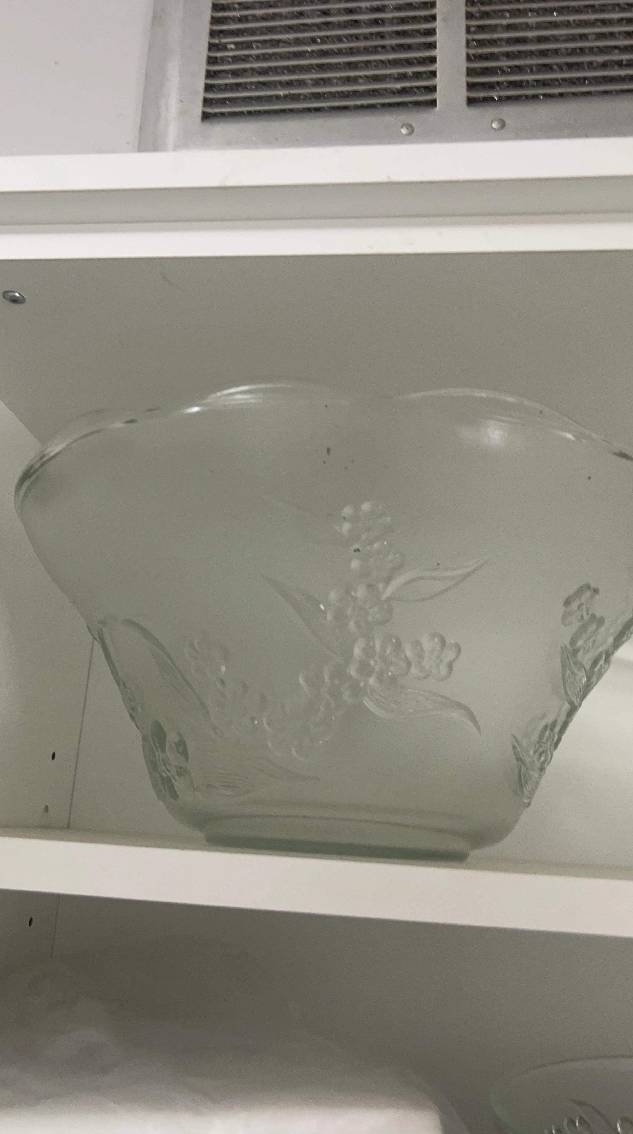 Frosted glass serving bowl with floral etchings
