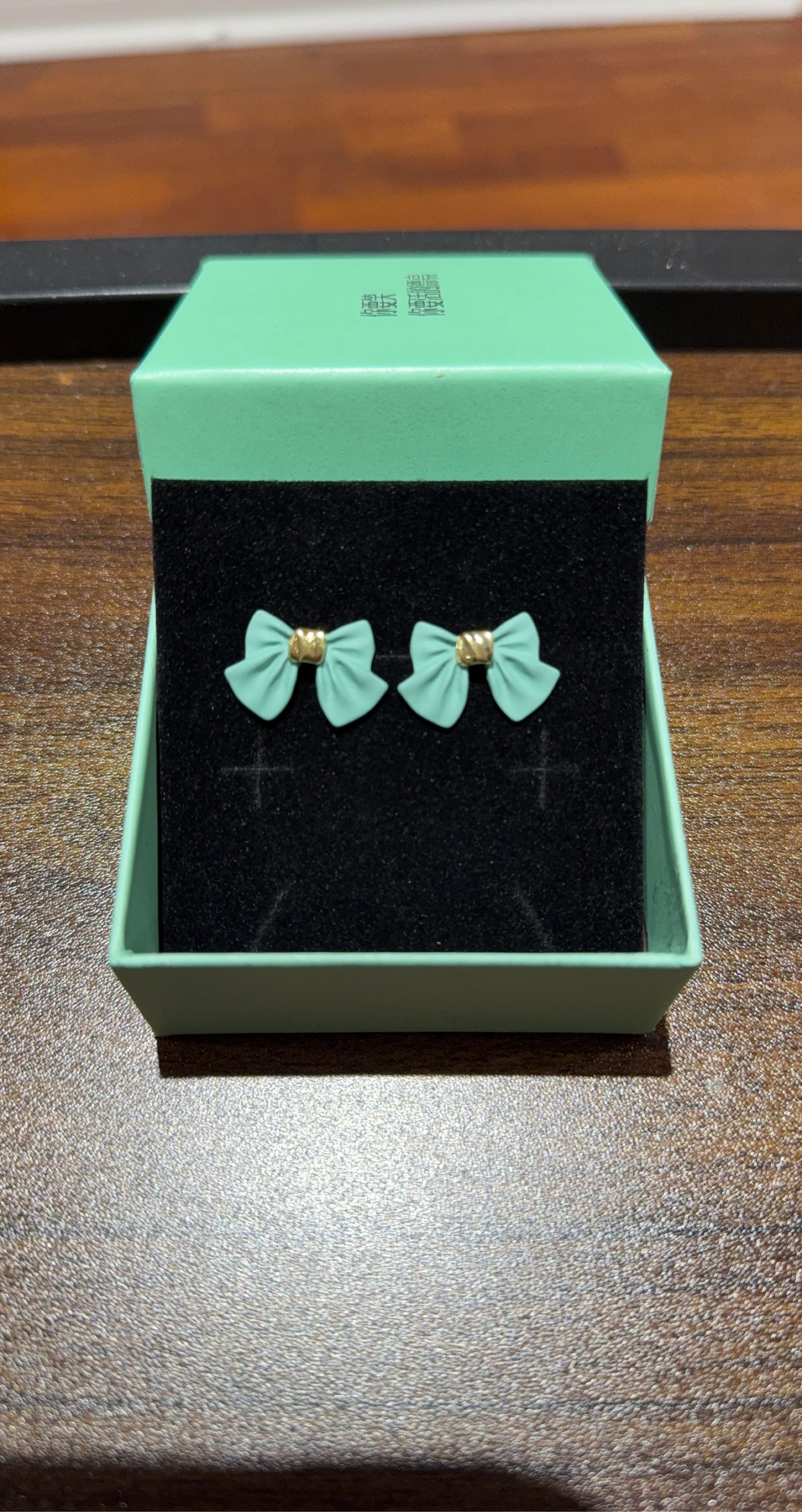 Mint Green Bow Earrings with Gold Accents