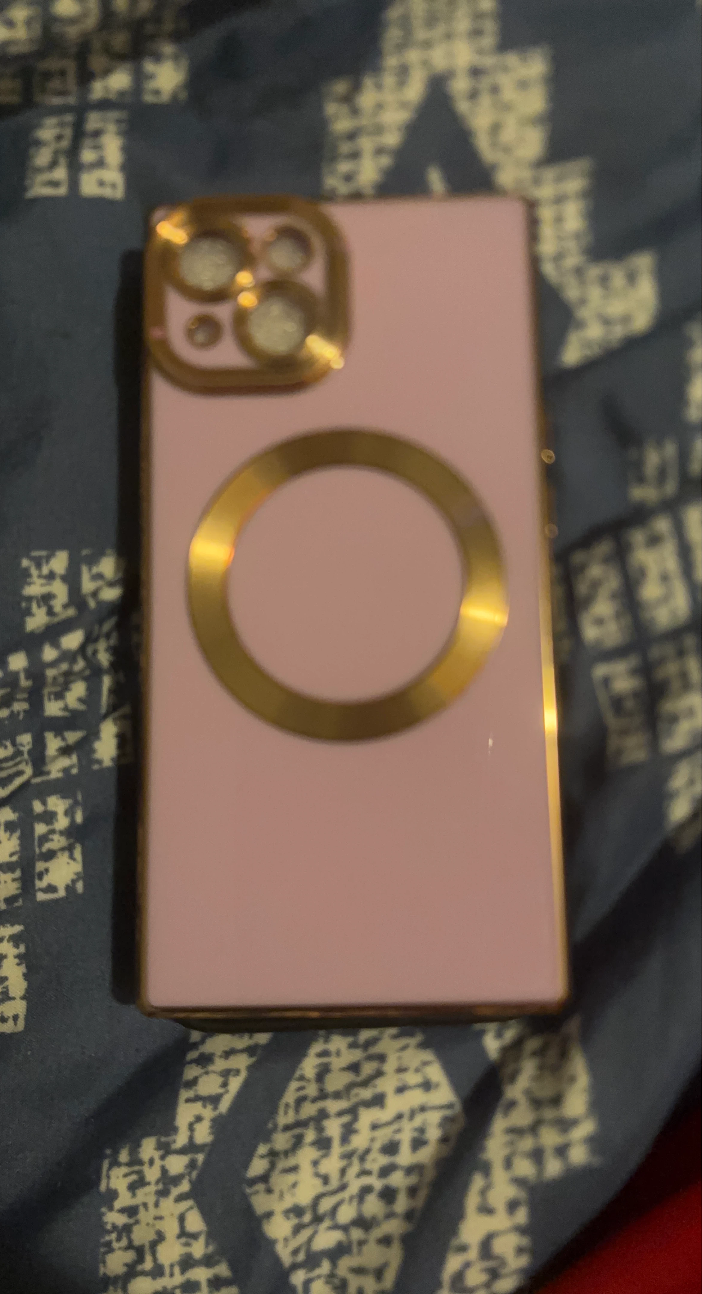 Pink Case with Gold Accents for iPhone 14 Pro