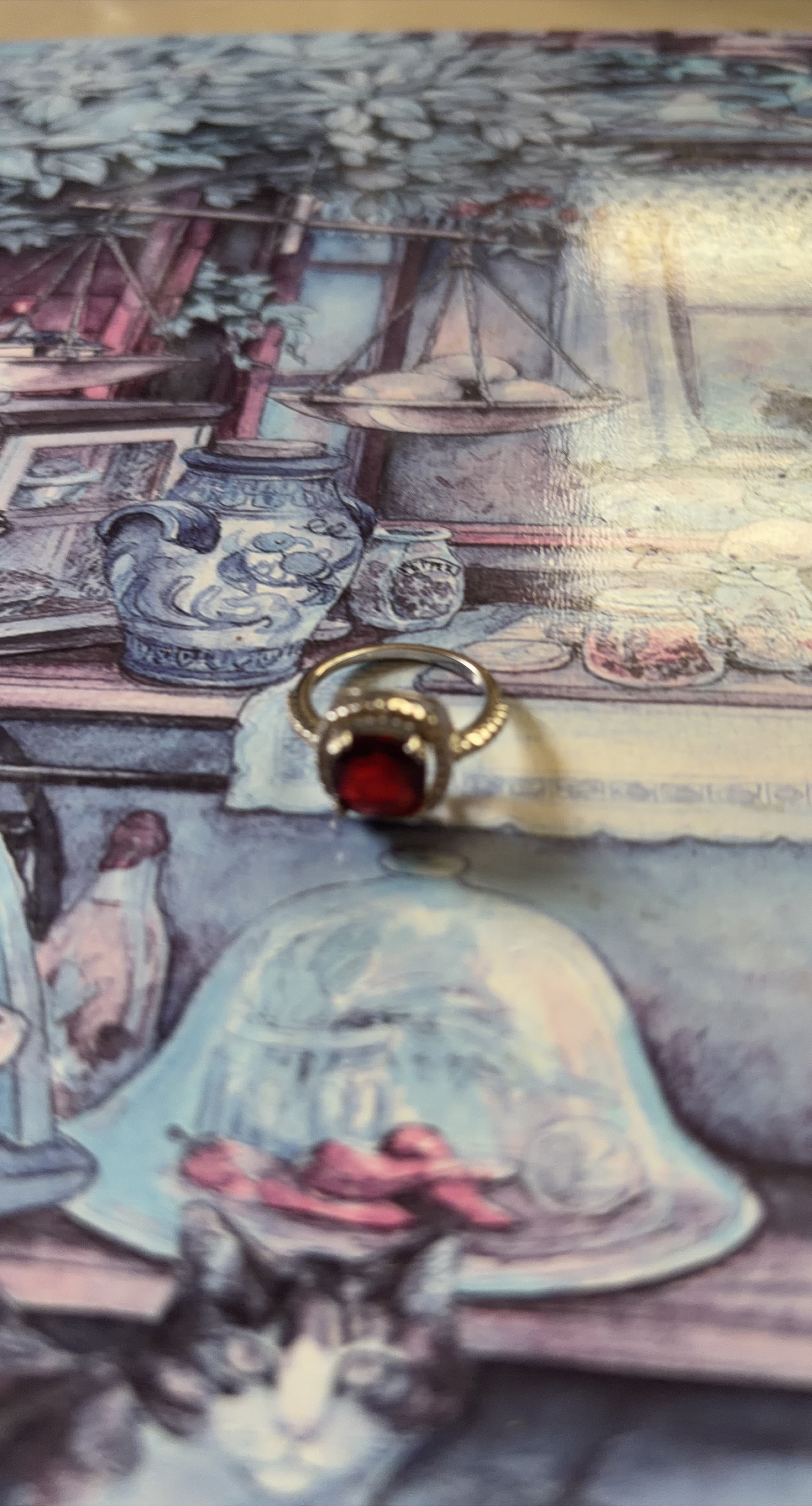 Gold ring with red stone