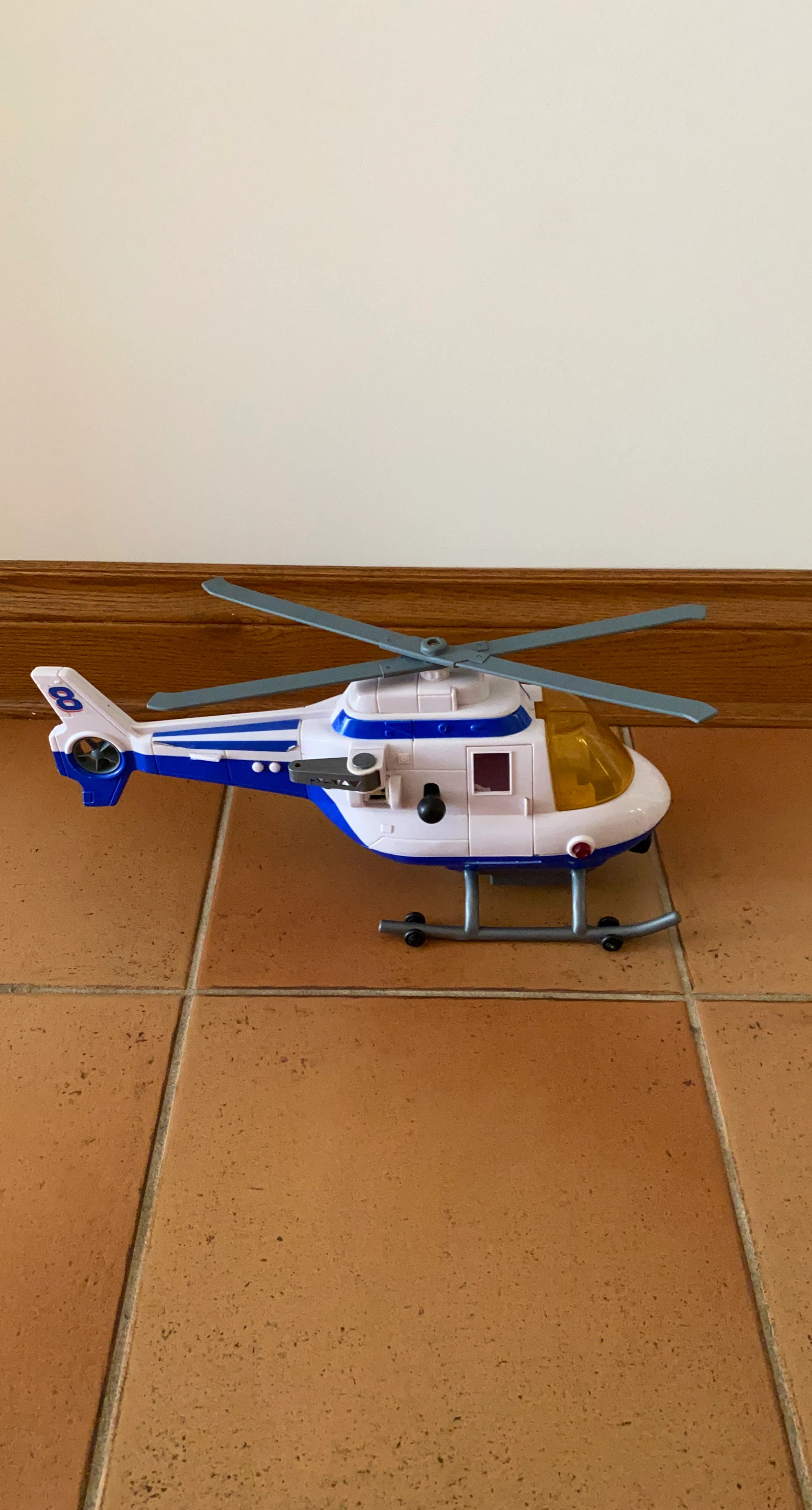 White and Blue Toy Helicopter