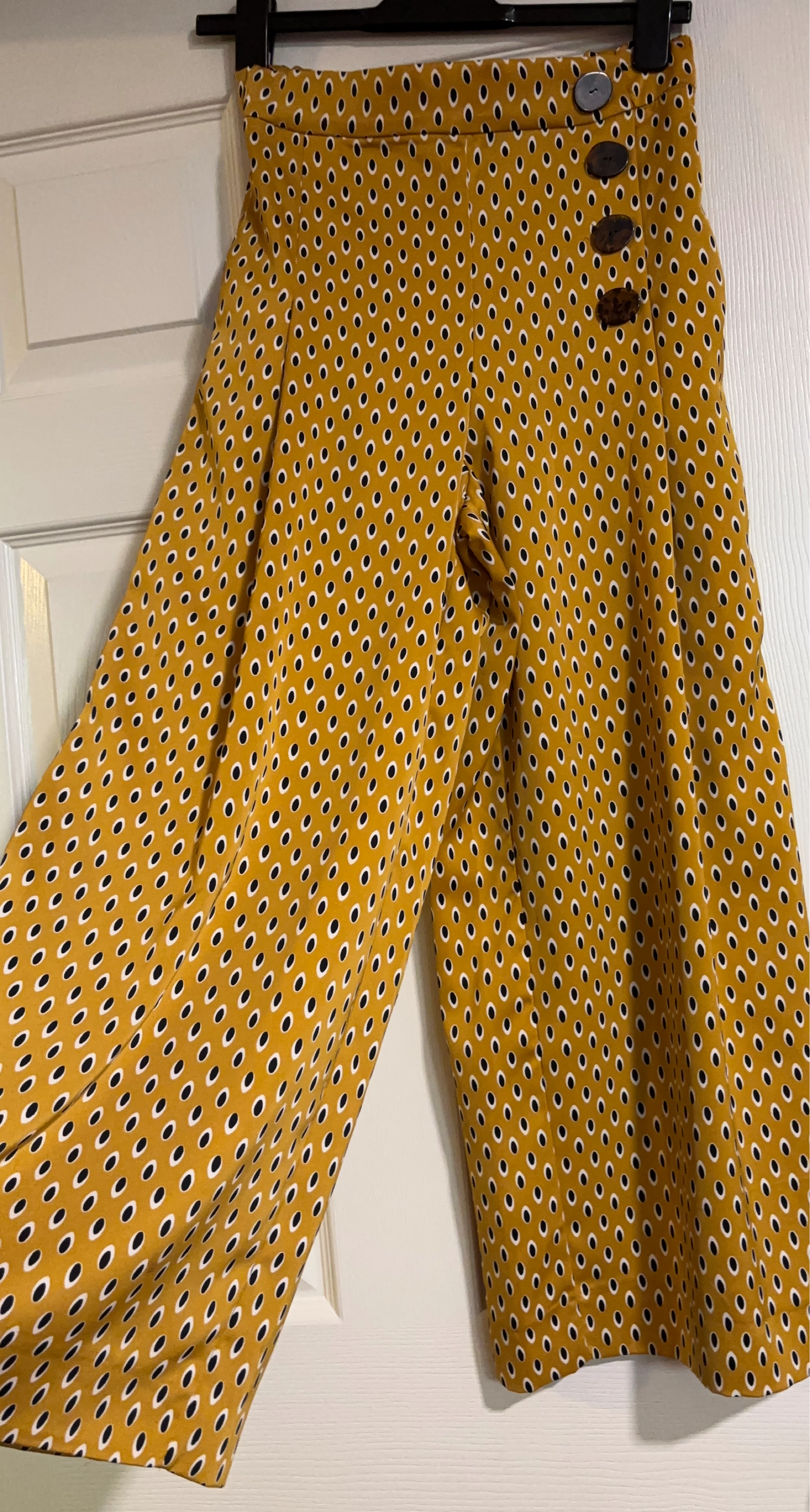 Yellow polka dot wide-leg pants