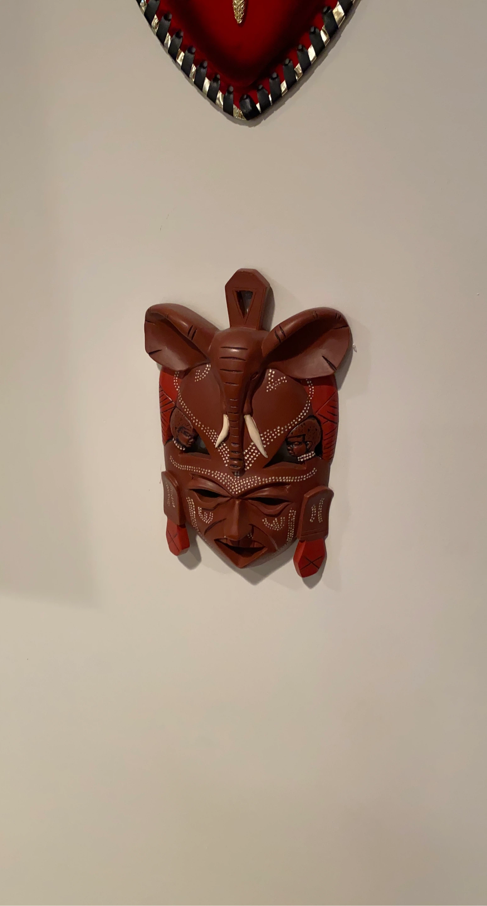 Hand Carved Wooden Mask with Elephant Detail