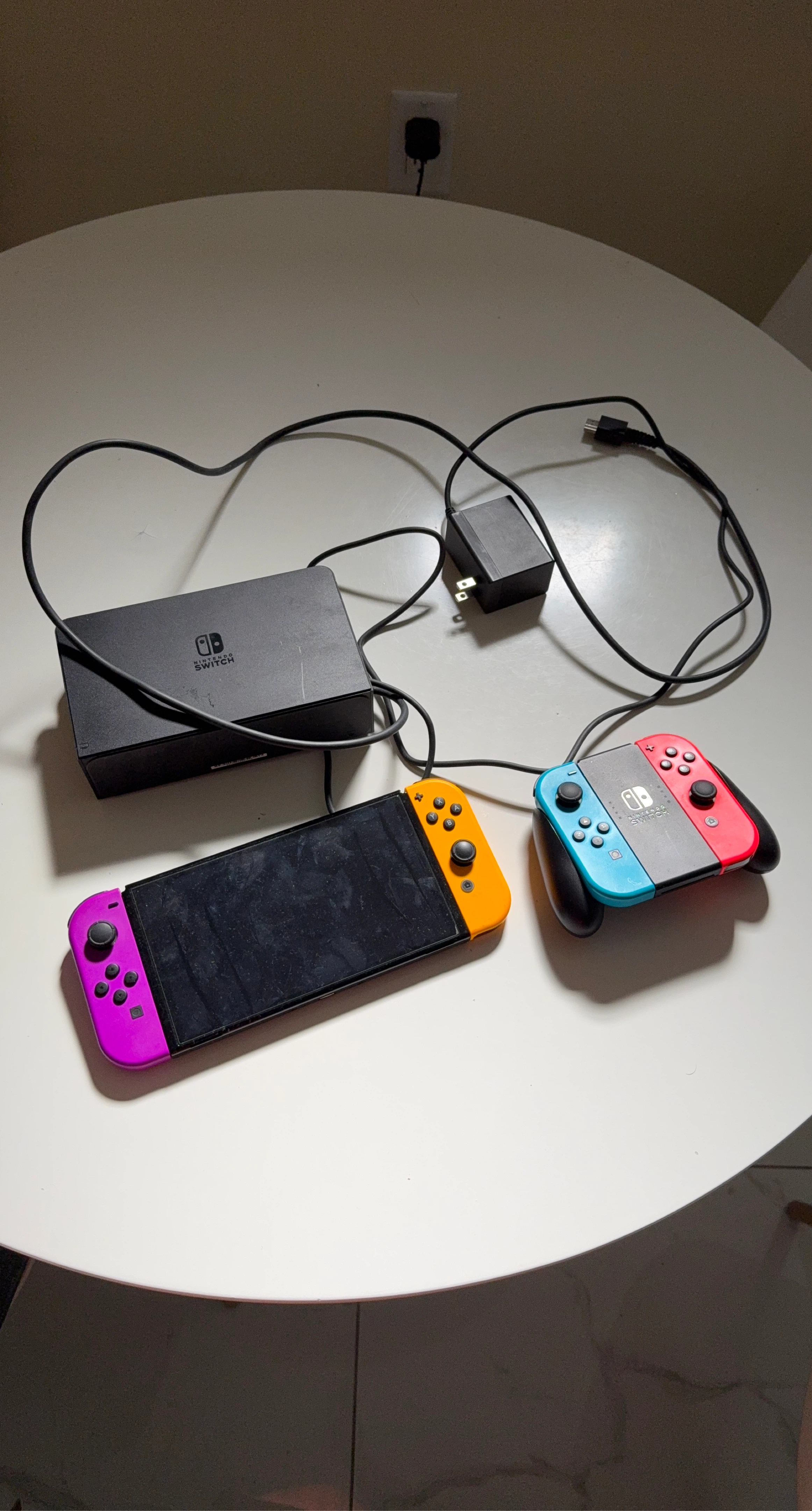 Nintendo Switch Console with Neon Red and Blue Joy-Cons