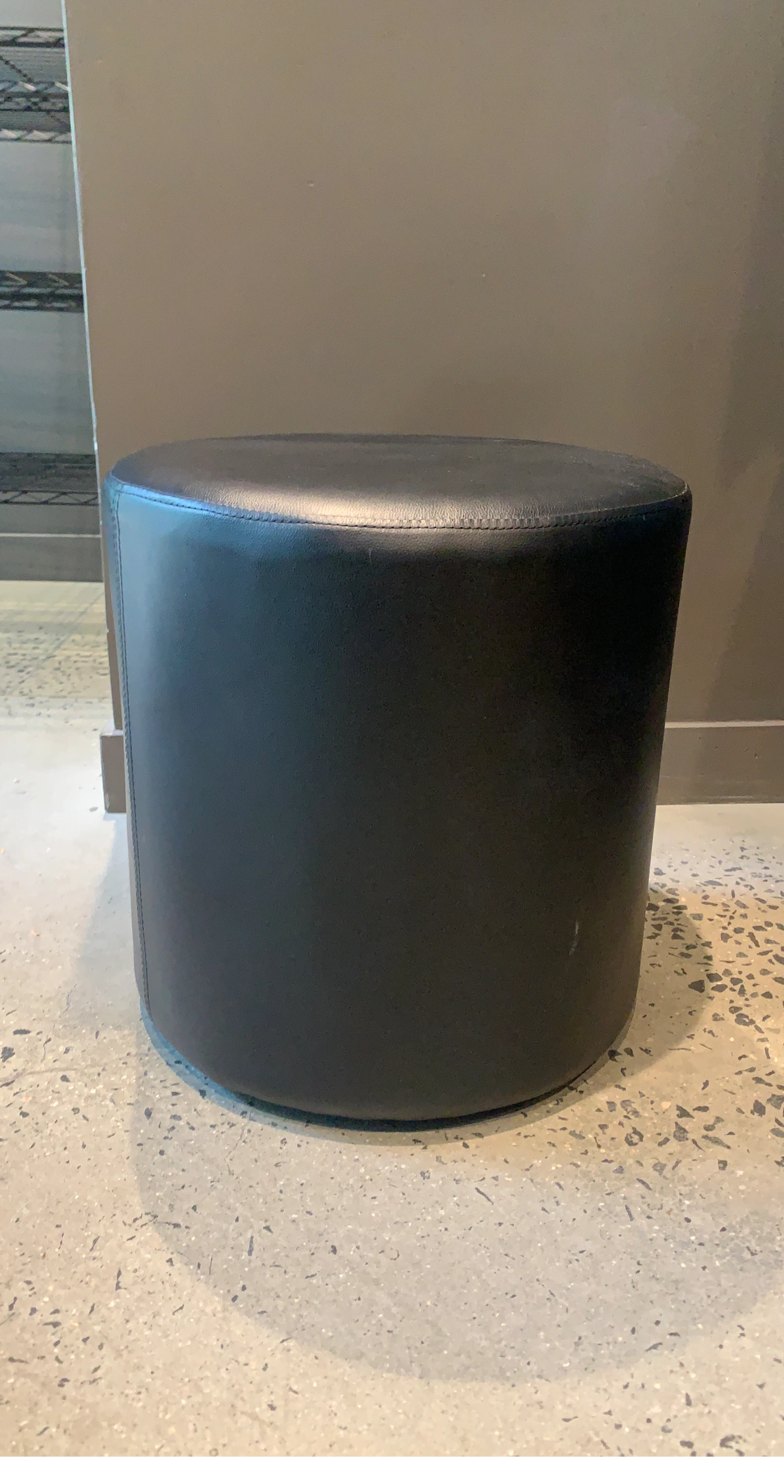 Black Round Faux Leather Ottoman/Stool
